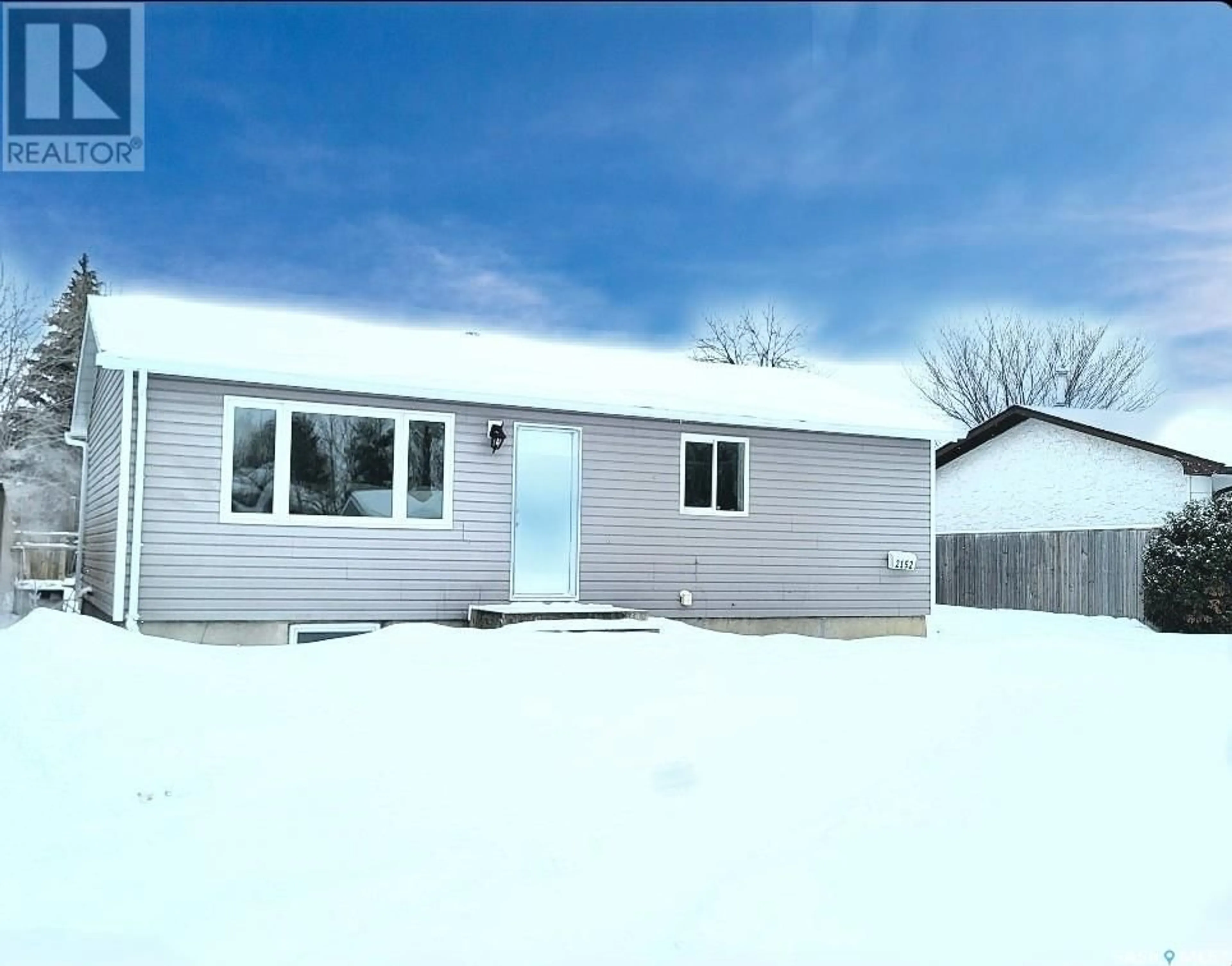 Home with vinyl exterior material, street for 2152 Deans CRESCENT, North Battleford Saskatchewan S9A3H9