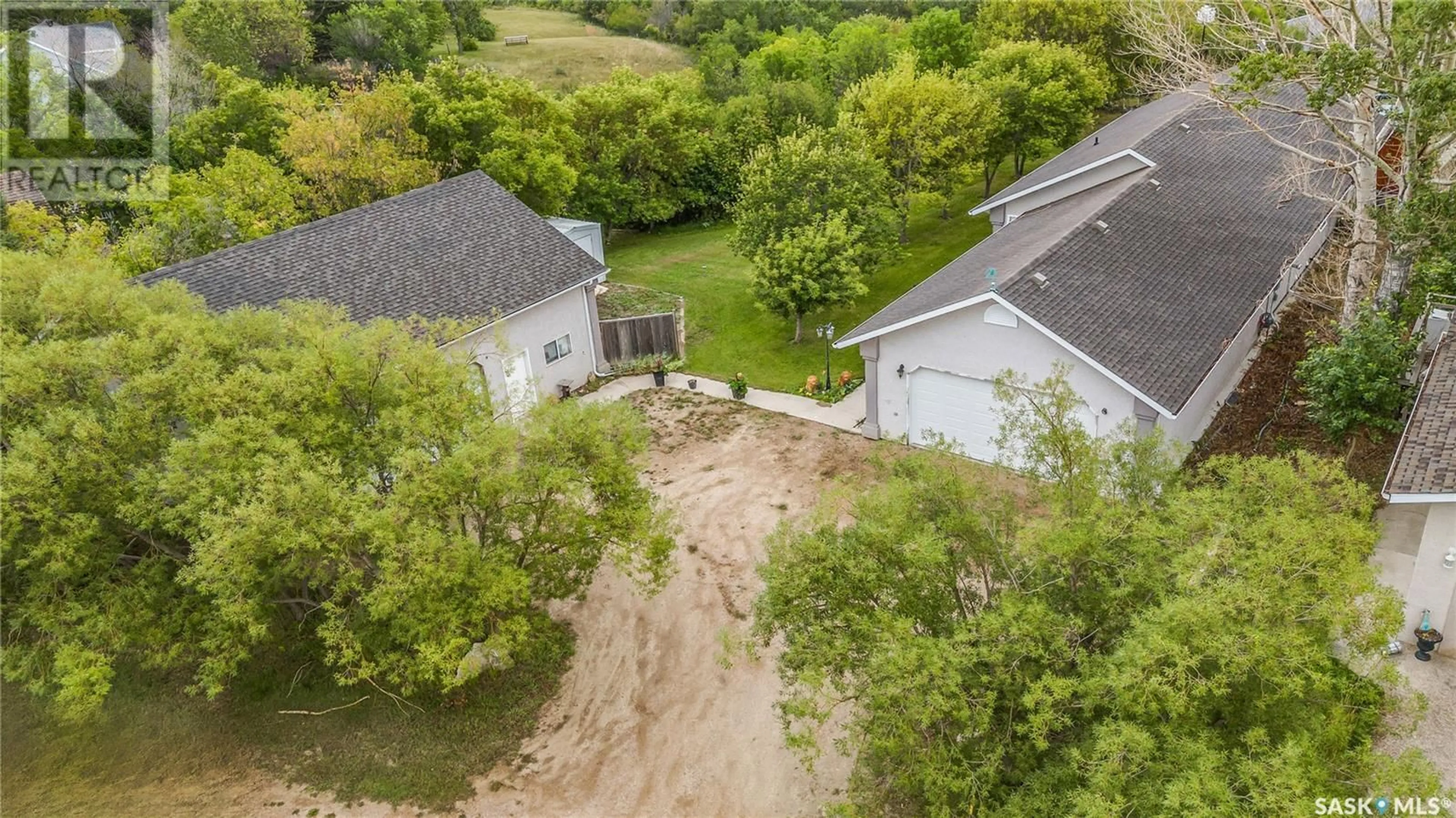 A pic from outside/outdoor area/front of a property/back of a property/a pic from drone, unknown for 11 Meadowlark DRIVE, Glen Harbour Saskatchewan S0G4L0