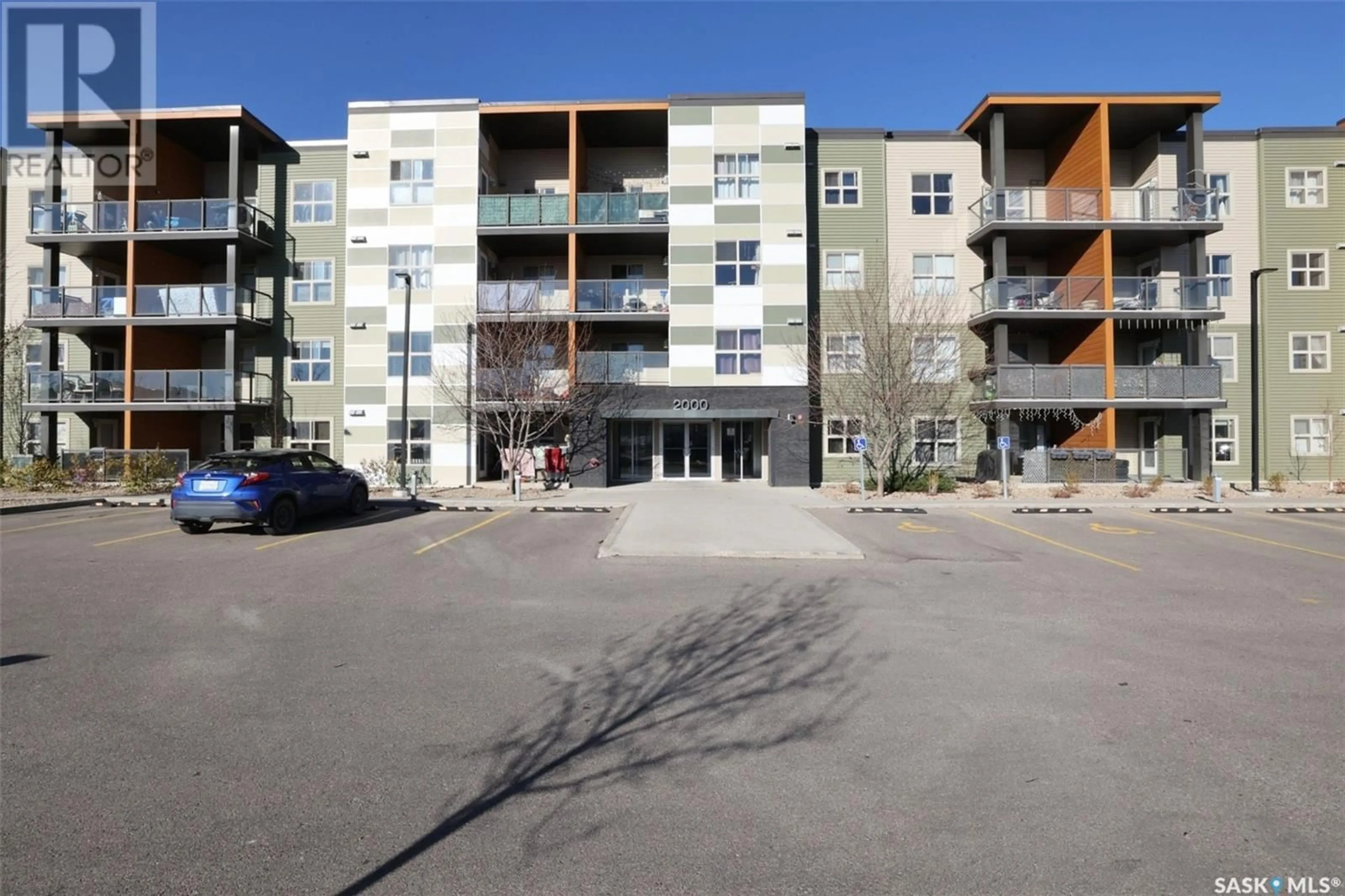 A pic from outside/outdoor area/front of a property/back of a property/a pic from drone, unknown for 2104 5500 Mitchinson WAY, Regina Saskatchewan S4W0N9