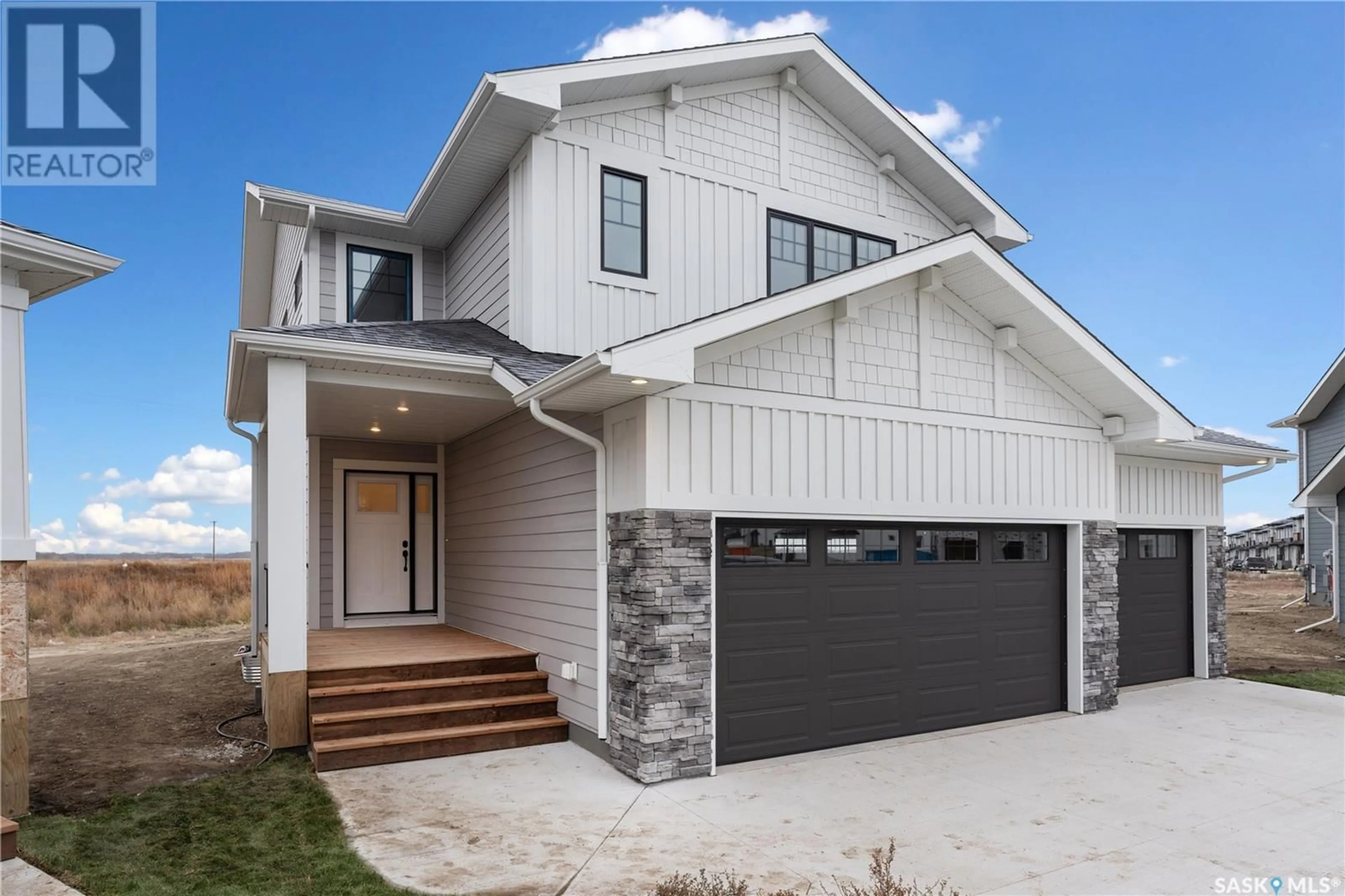 Home with vinyl exterior material, street for 272 Oliver LANE, Martensville Saskatchewan S0K2T0