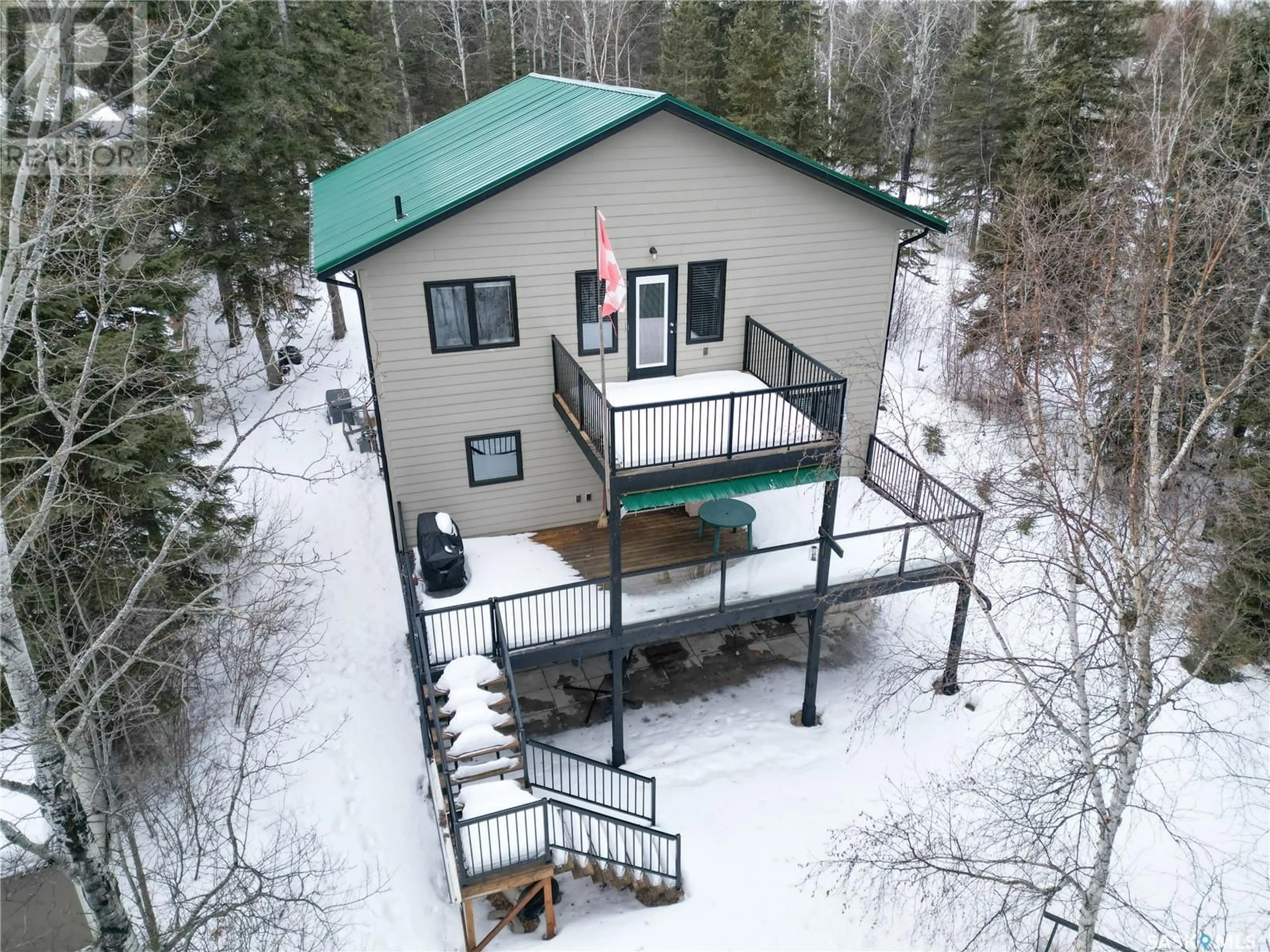 A pic from outside/outdoor area/front of a property/back of a property/a pic from drone, water/lake/river/ocean view for 1305 LAURIE PLACE, Paddockwood Rm No. 520 Saskatchewan S0J0N0