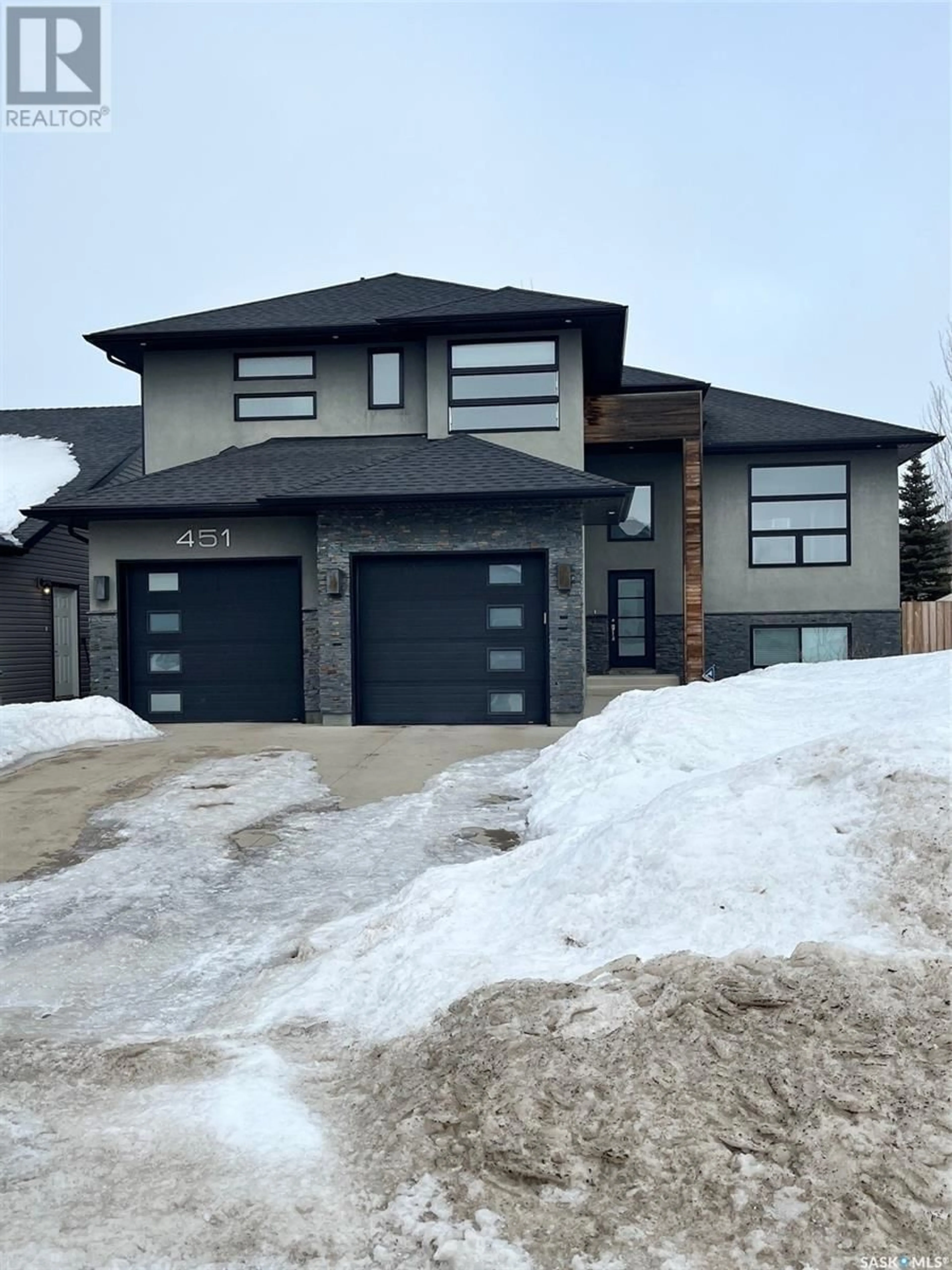 Home with brick exterior material, street for 451 Werschner LANE, Saskatoon Saskatchewan S7V0E1