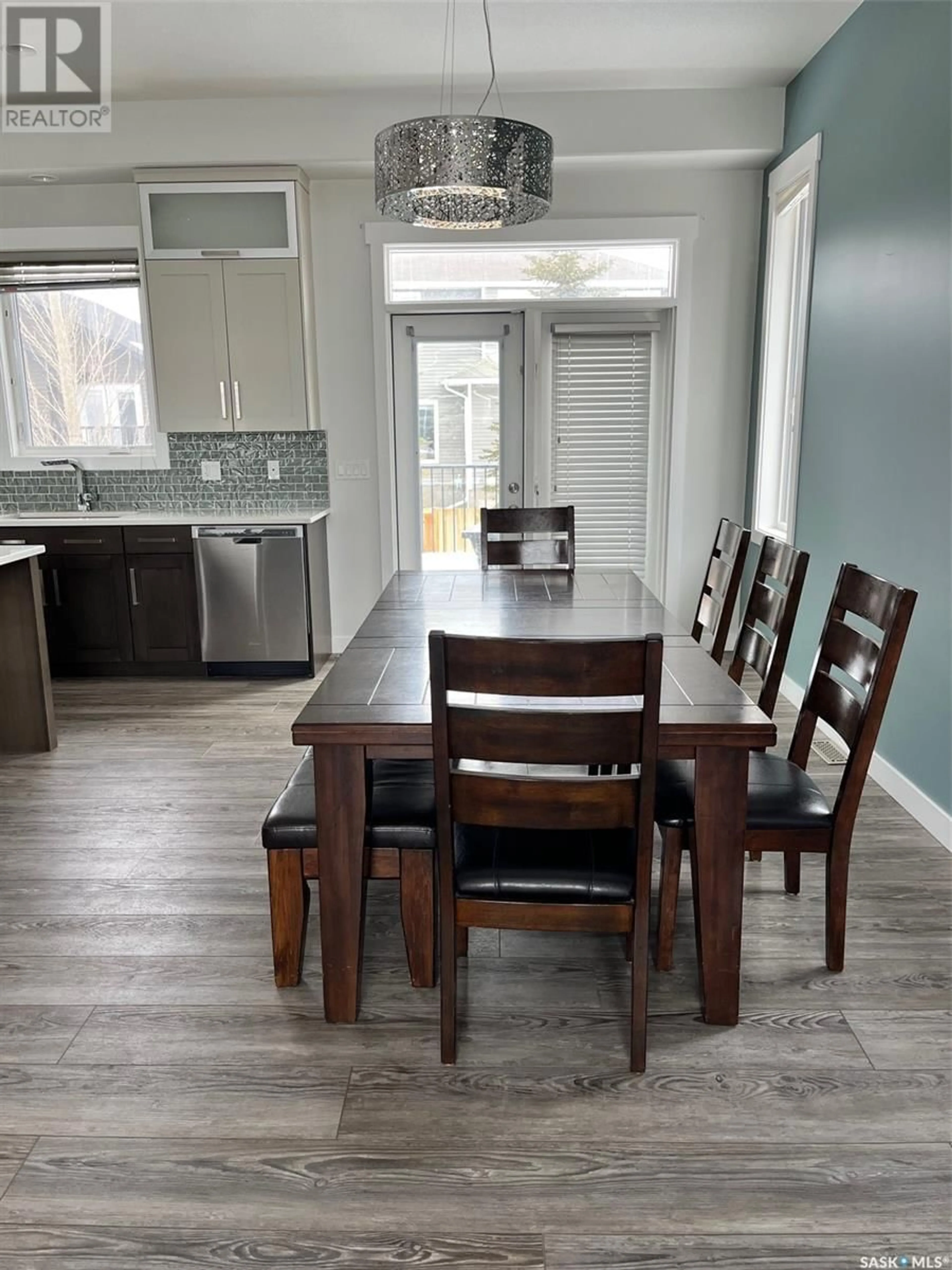 Dining room, wood/laminate floor for 451 Werschner LANE, Saskatoon Saskatchewan S7V0E1