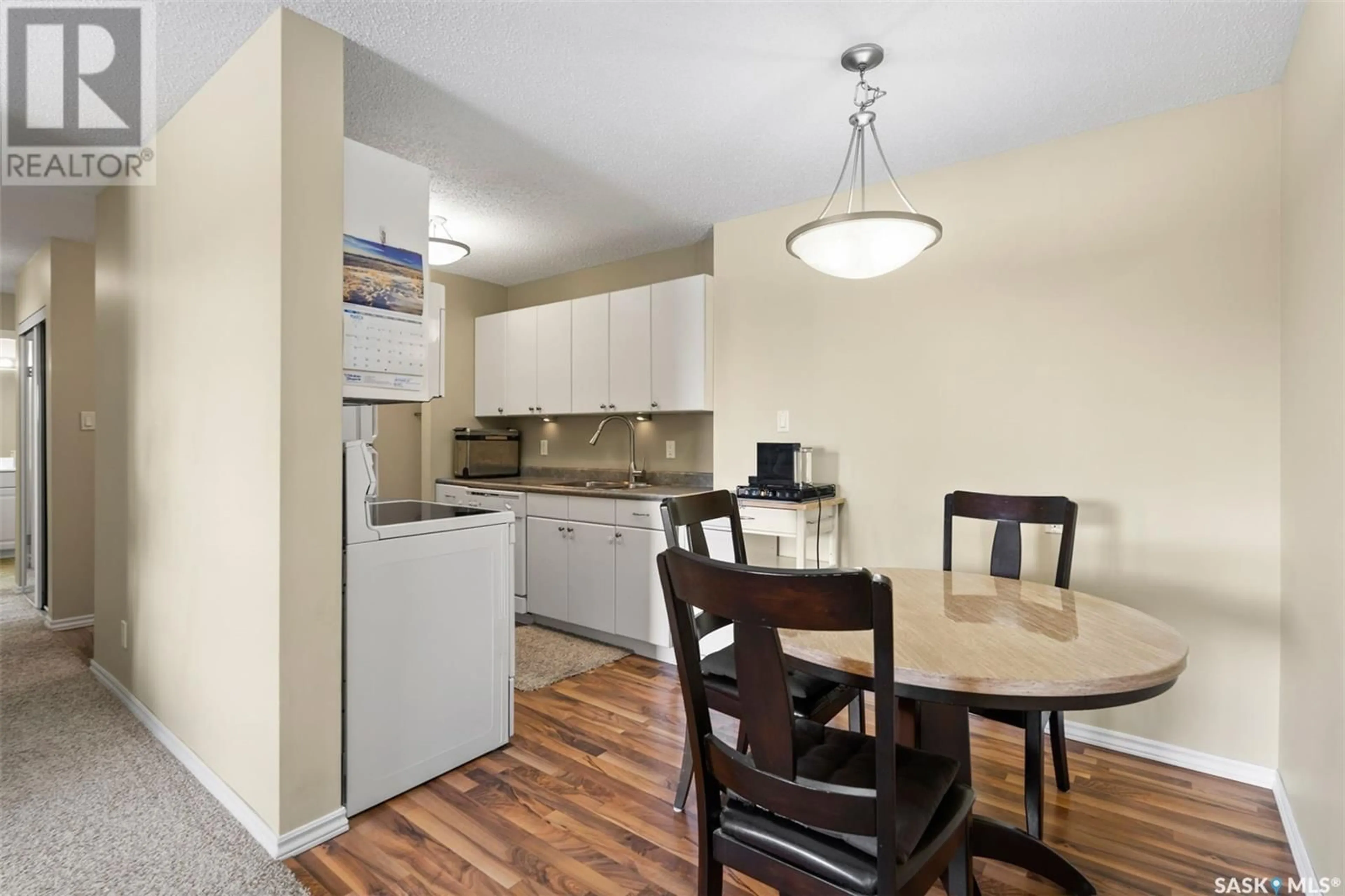 Standard kitchen, wood/laminate floor for 306 215 Tait PLACE, Saskatoon Saskatchewan S7H5L5