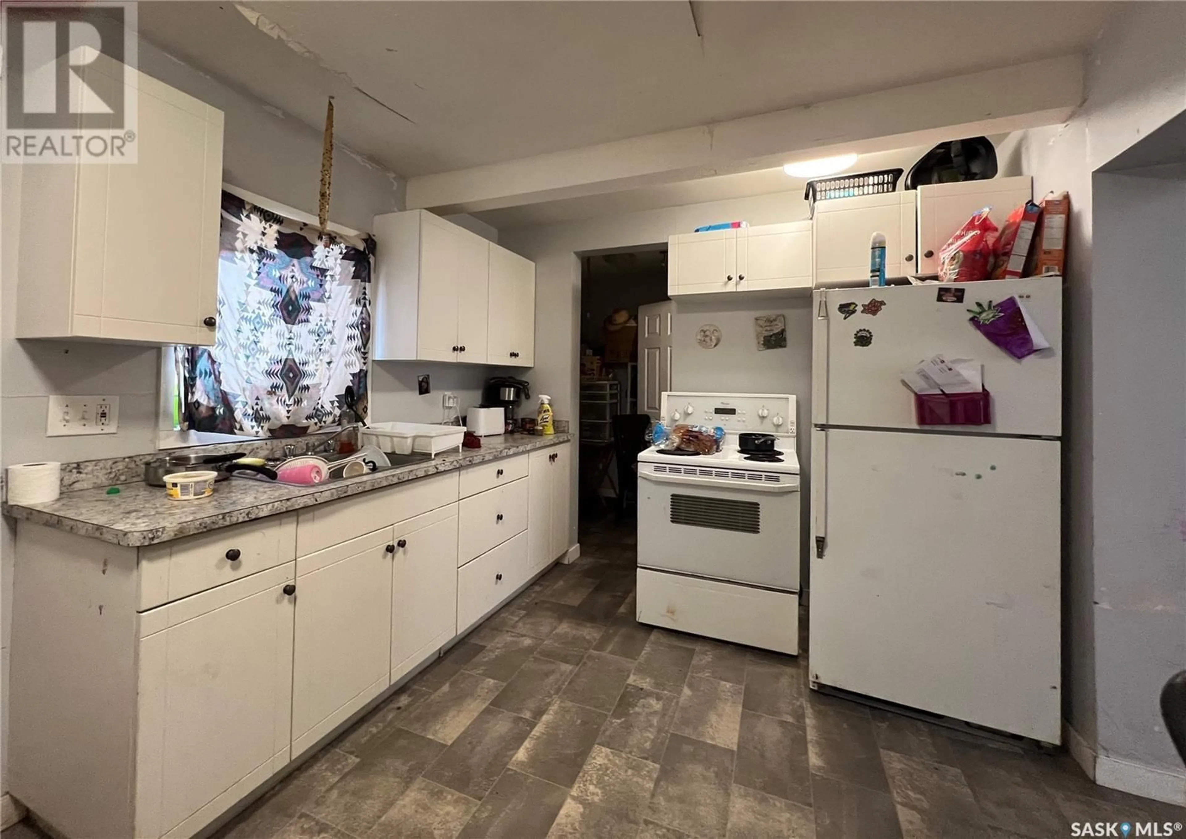 Standard kitchen, ceramic/tile floor for 211 K AVENUE S, Saskatoon Saskatchewan S7M2C7