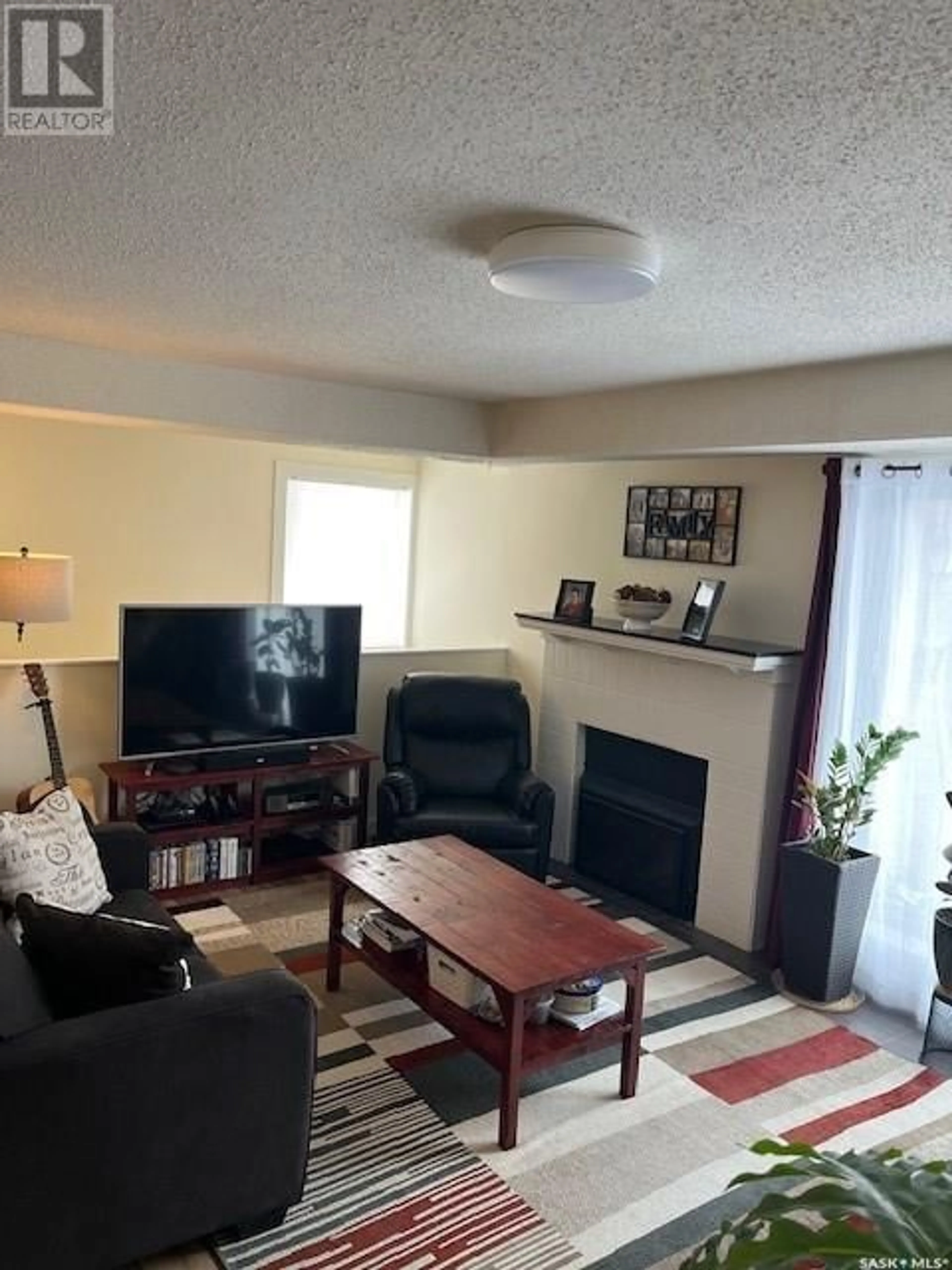 Living room with furniture, unknown for 202 443 Pendygrasse ROAD, Saskatoon Saskatchewan S7M5C1