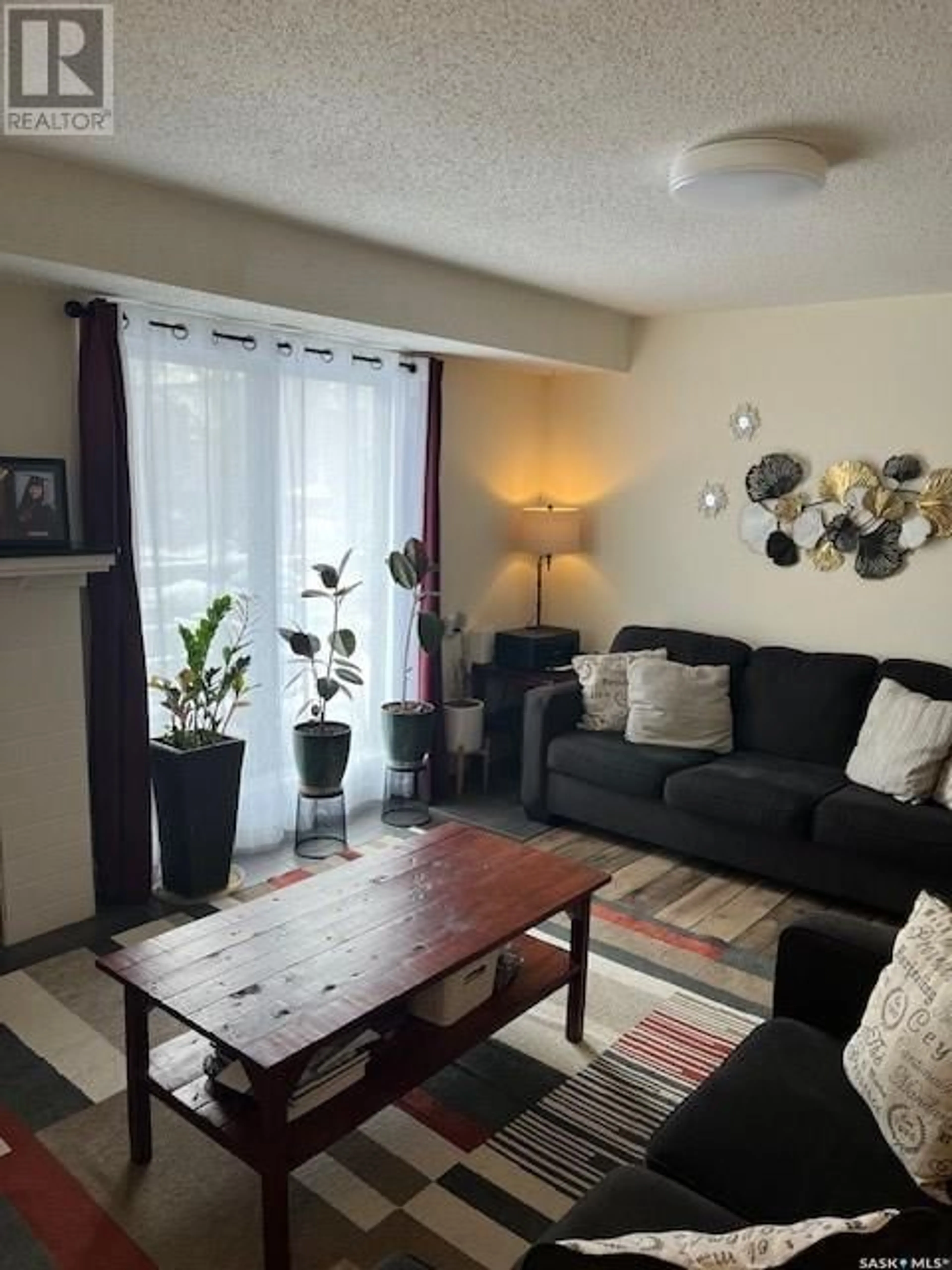 Living room with furniture, unknown for 202 443 Pendygrasse ROAD, Saskatoon Saskatchewan S7M5C1