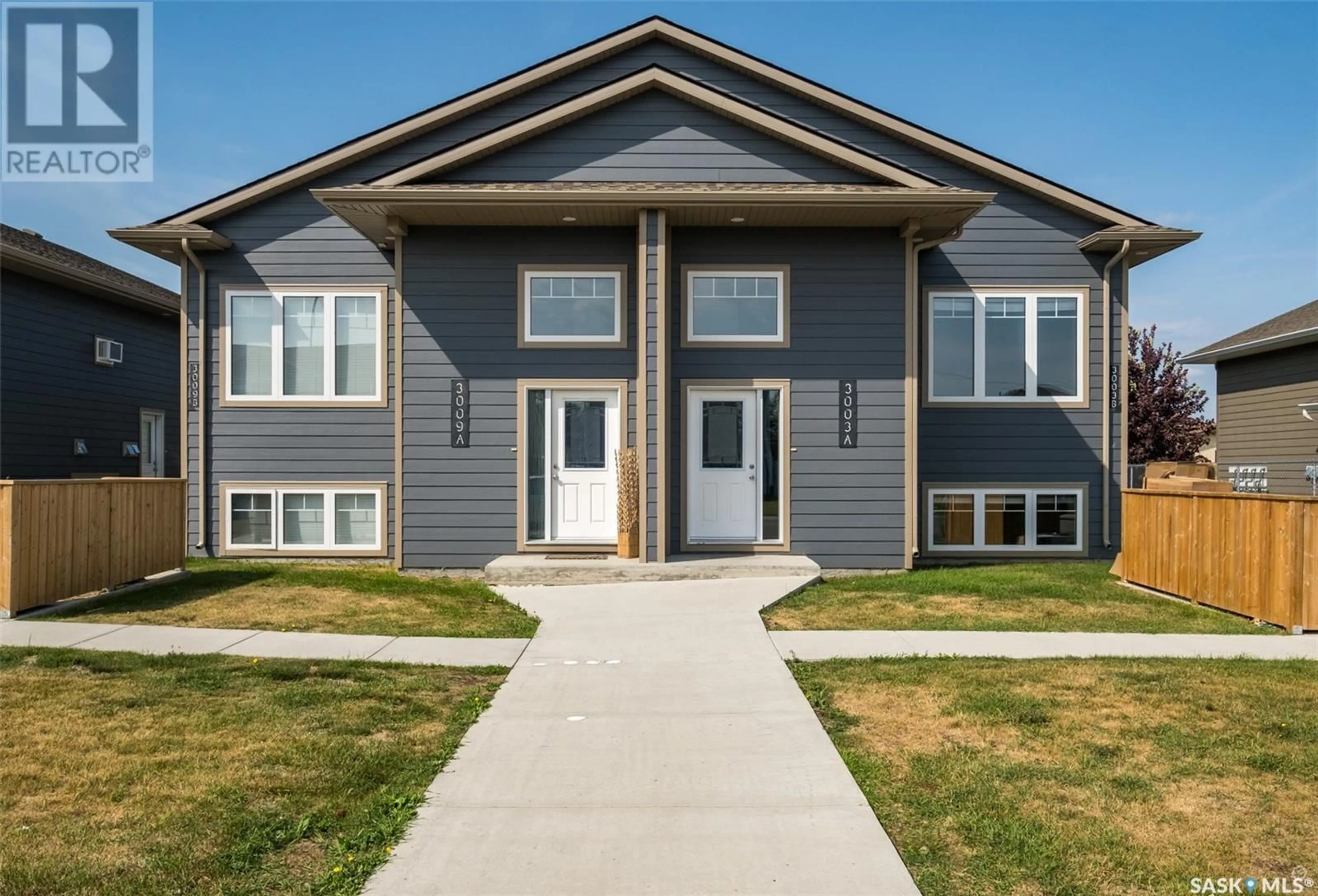 Home with vinyl exterior material, street for 3003/3009 5A AVENUE, Prince Albert Saskatchewan S6V7K4