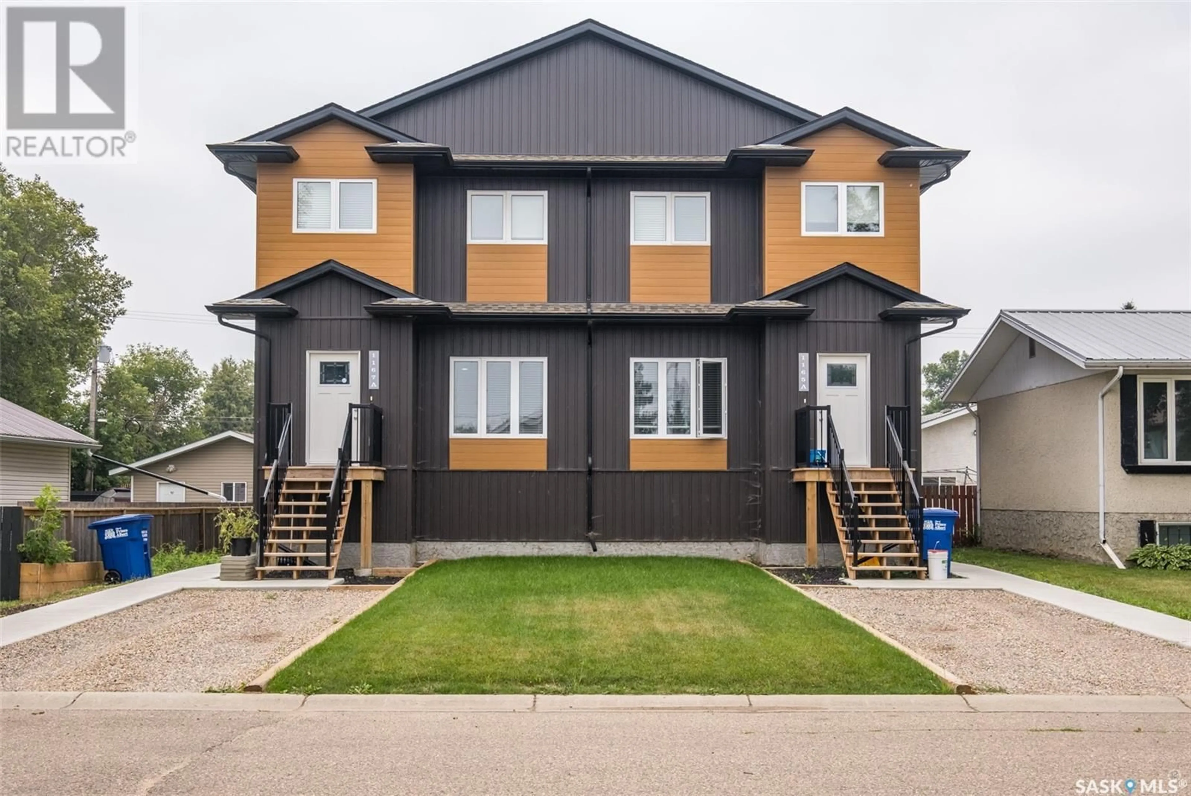 Home with vinyl exterior material, street for 1165/1167 2nd STREET E, Prince Albert Saskatchewan S6V0G9