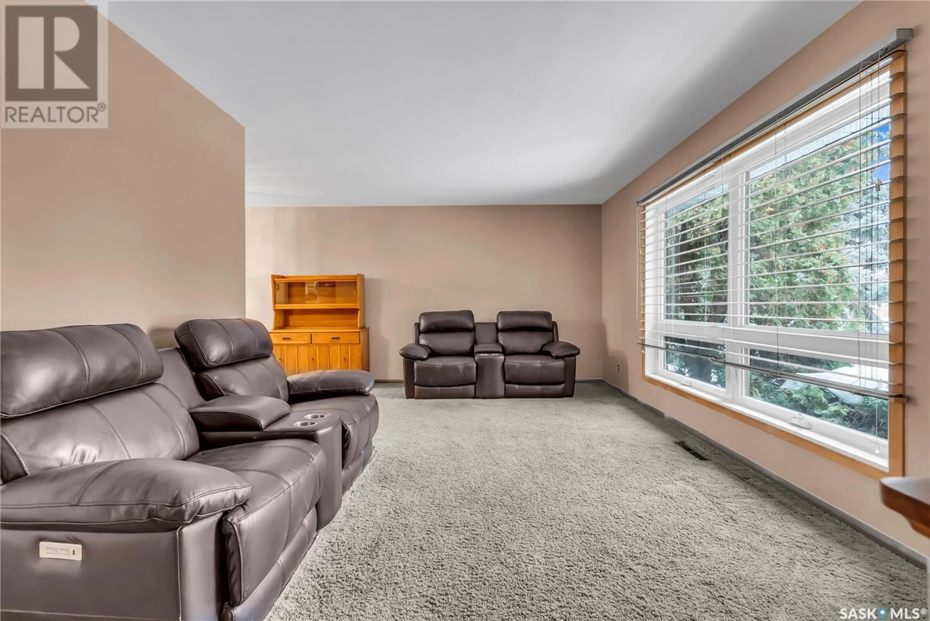 Living room with furniture, carpet floor for 2804 Estey DRIVE, Saskatoon Saskatchewan S7J2V7