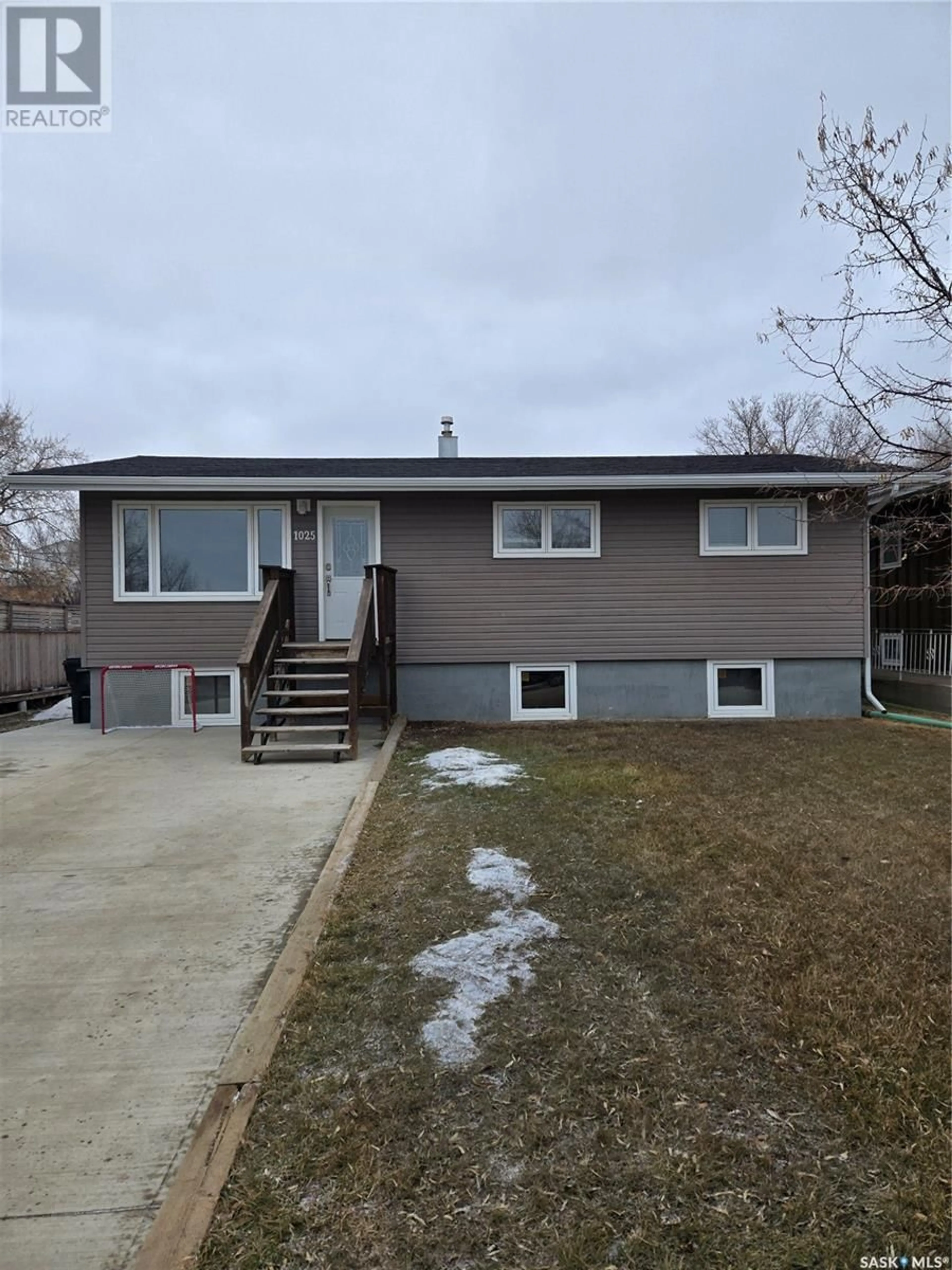 Home with vinyl exterior material, street for 1025 Valley STREET, Estevan Saskatchewan S4A0E2