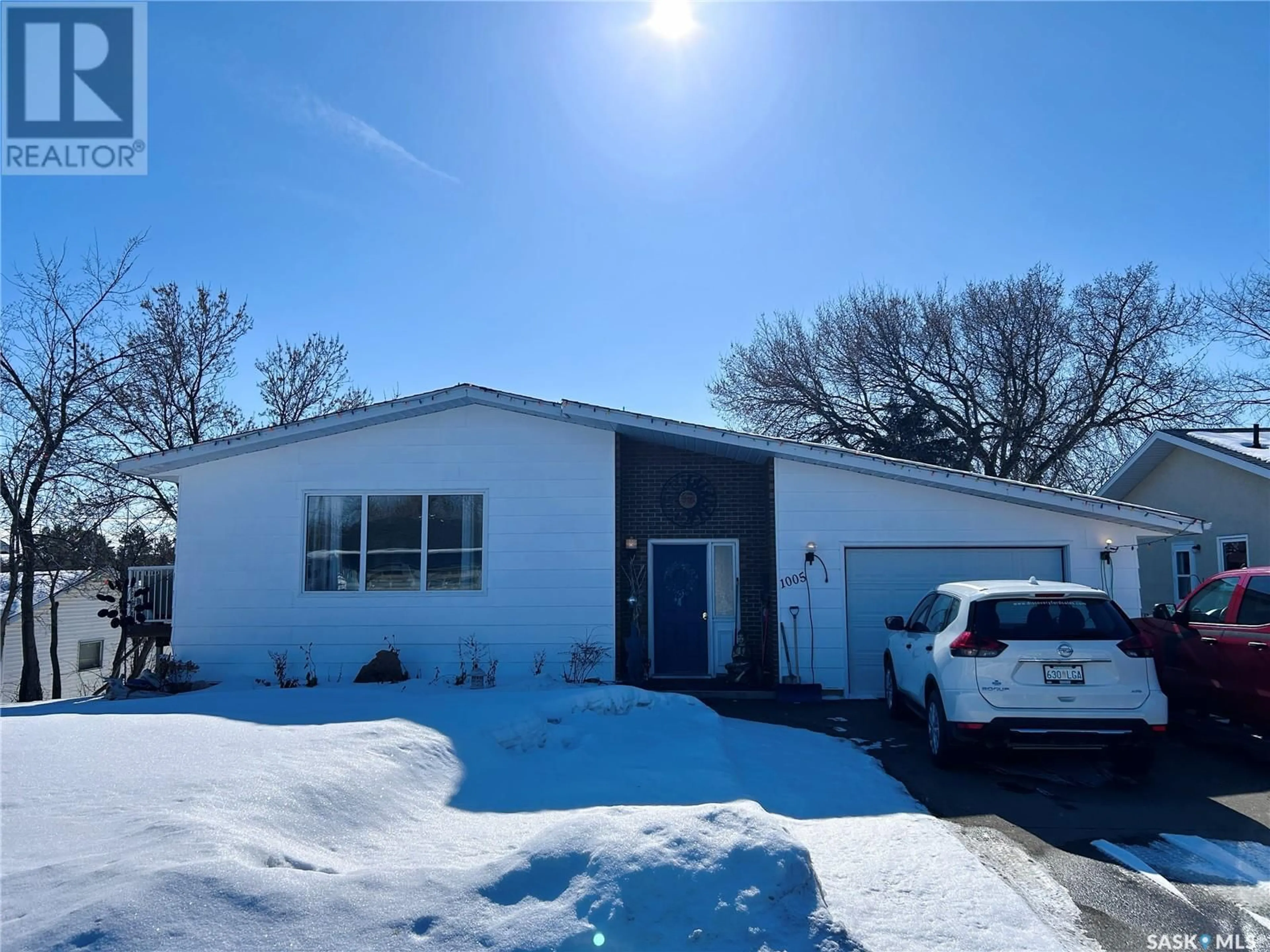 A pic from outside/outdoor area/front of a property/back of a property/a pic from drone, street for 1005 10th STREET, Rosthern Saskatchewan S0K3R0