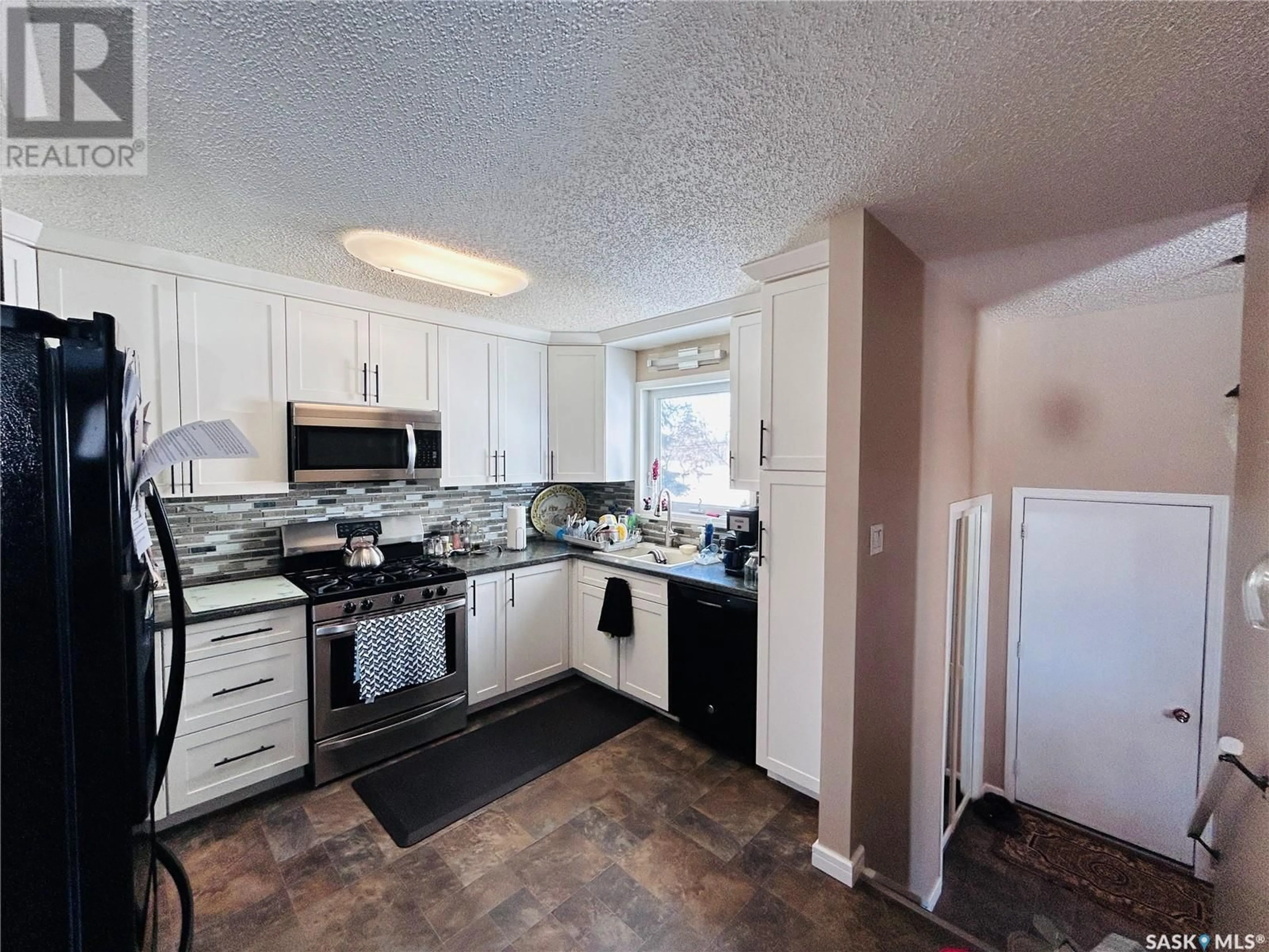 Standard kitchen, ceramic/tile floor for 1005 10th STREET, Rosthern Saskatchewan S0K3R0