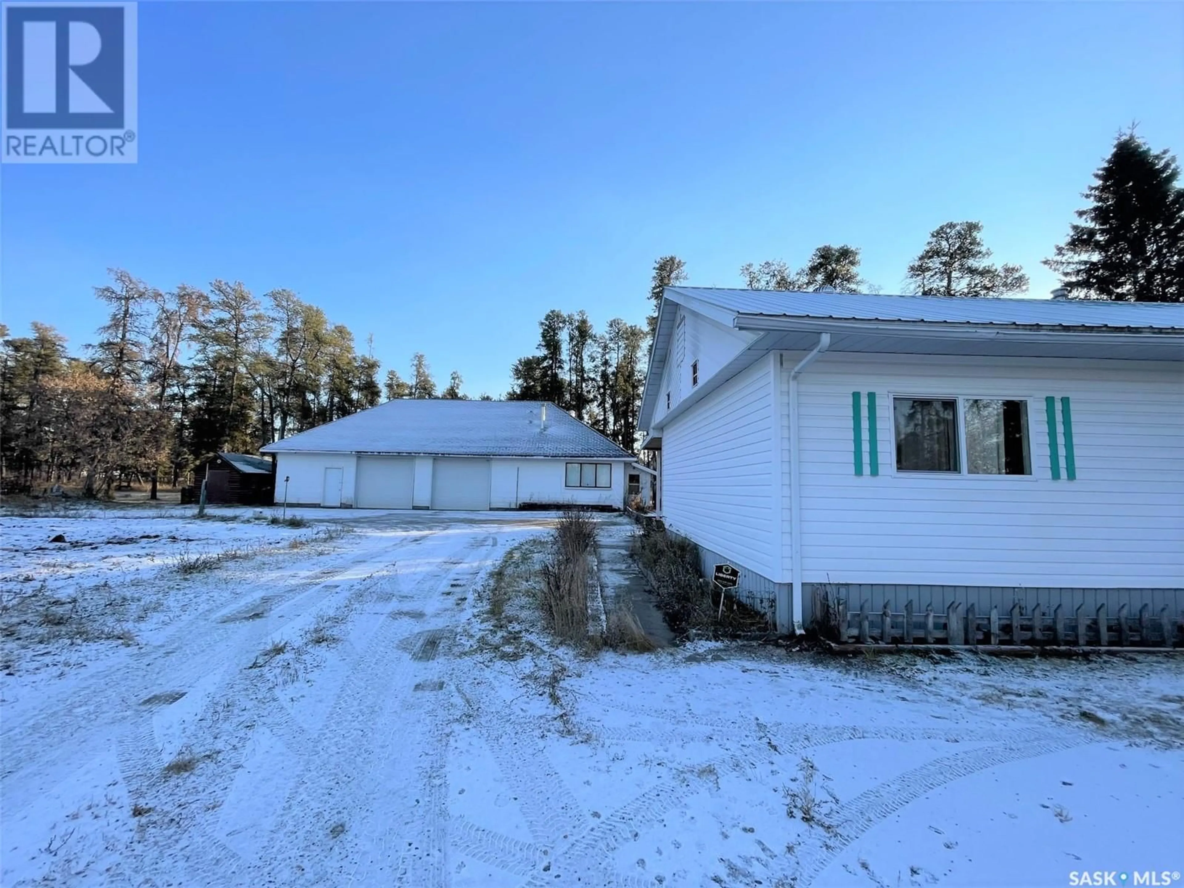 A pic from outside/outdoor area/front of a property/back of a property/a pic from drone, street for Robinson-Cooke, Hudson Bay Saskatchewan S0E0Y0