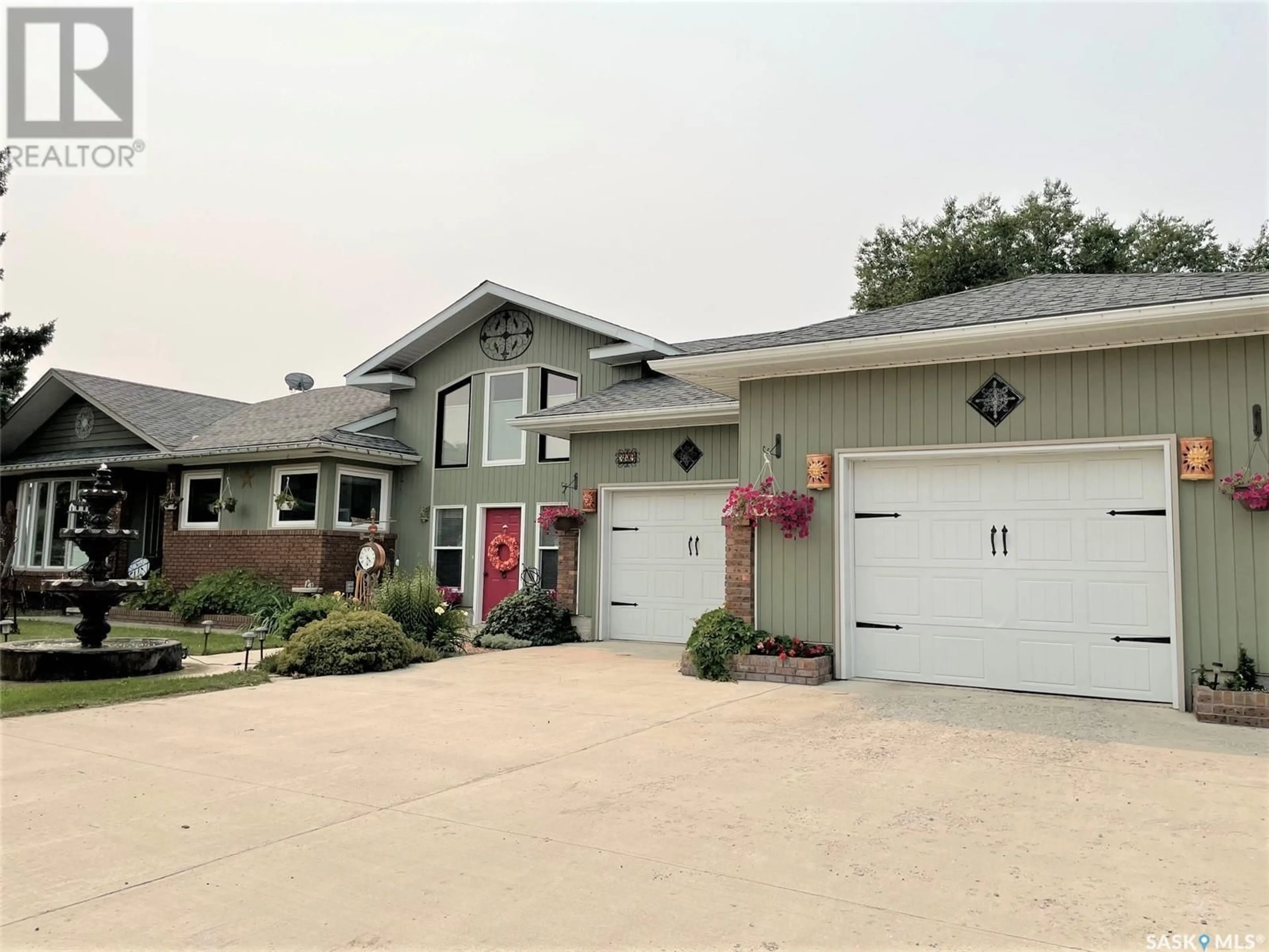 Home with vinyl exterior material, street for 309 Prince STREET, Hudson Bay Saskatchewan S0E0Y0