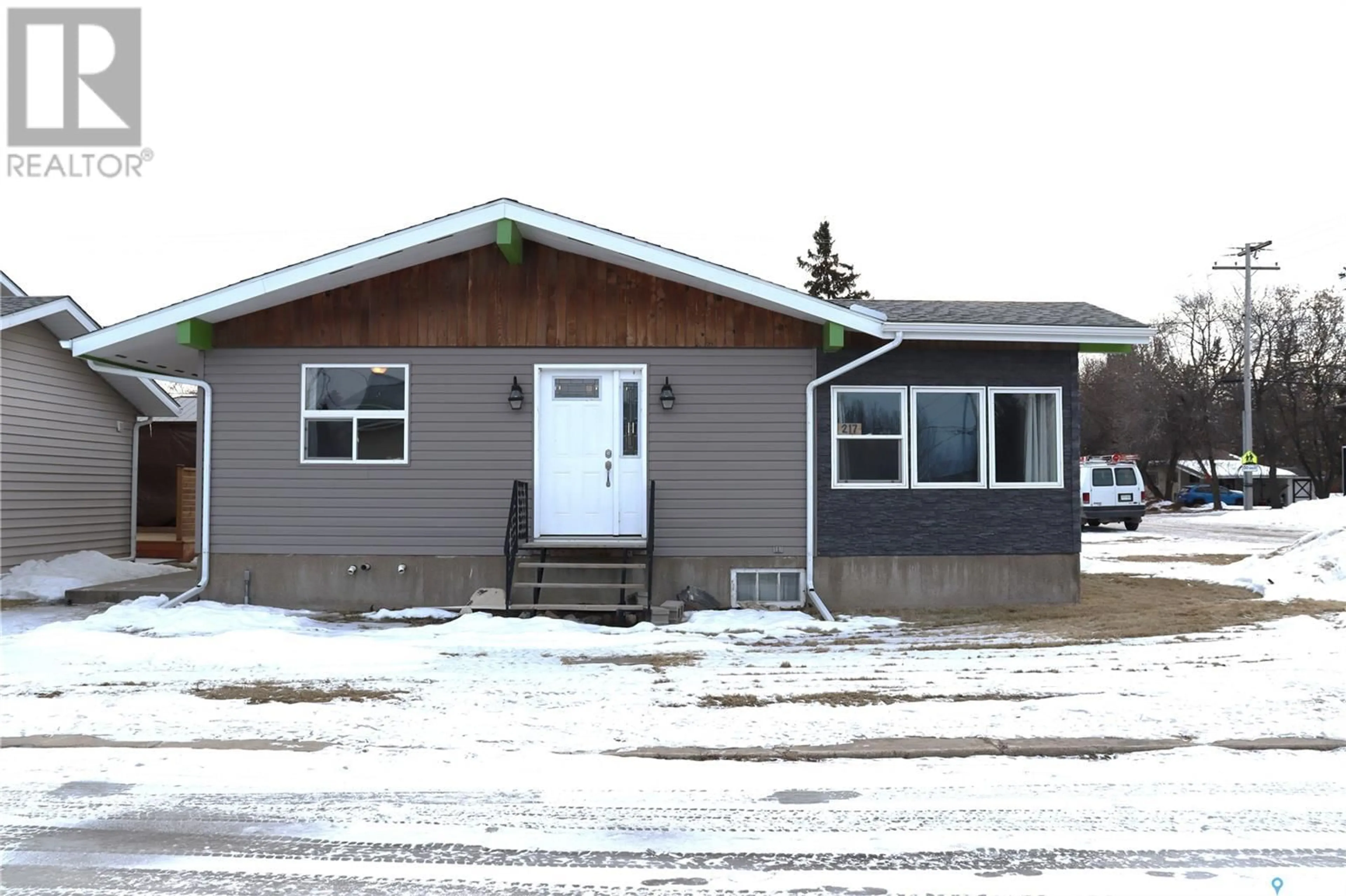 Home with vinyl exterior material, street for 217 Second AVENUE E, Debden Saskatchewan S0J0S0