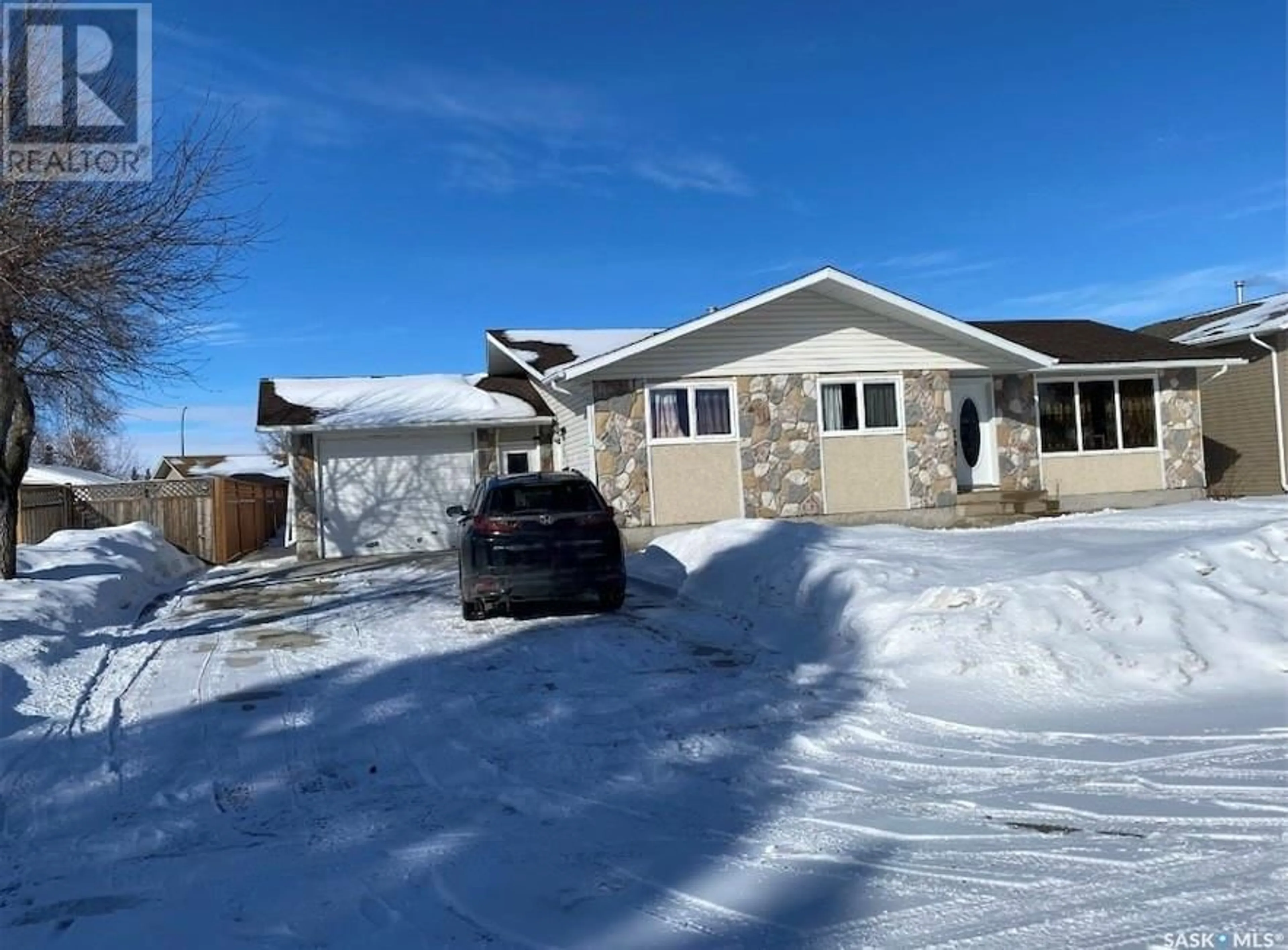 Home with vinyl exterior material, street for 1016 CARLTON DRIVE, Esterhazy Saskatchewan S0A0X0