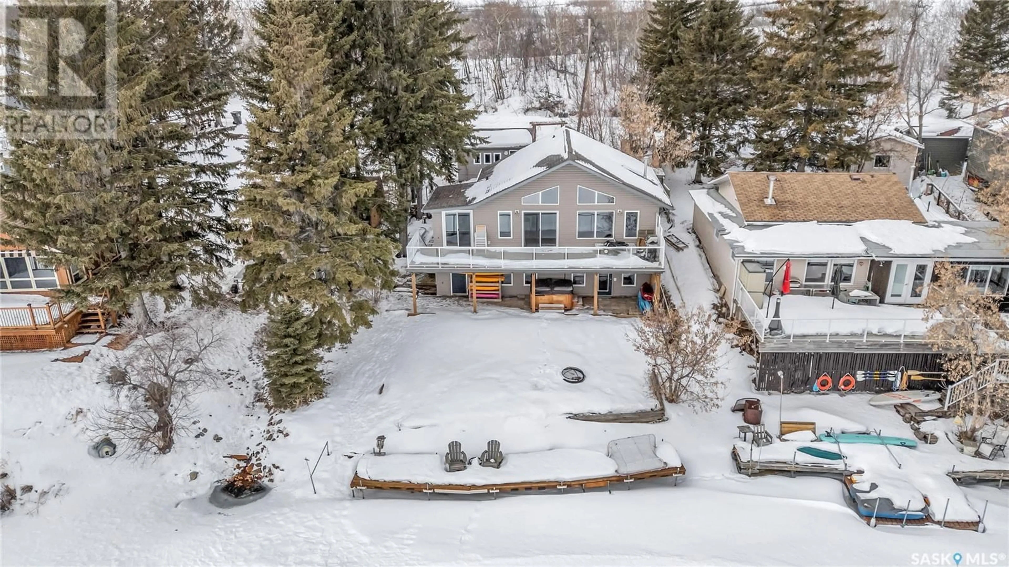 A pic from outside/outdoor area/front of a property/back of a property/a pic from drone, mountain view for 67 Navy AVENUE, Pike Lake Saskatchewan S7K1N2