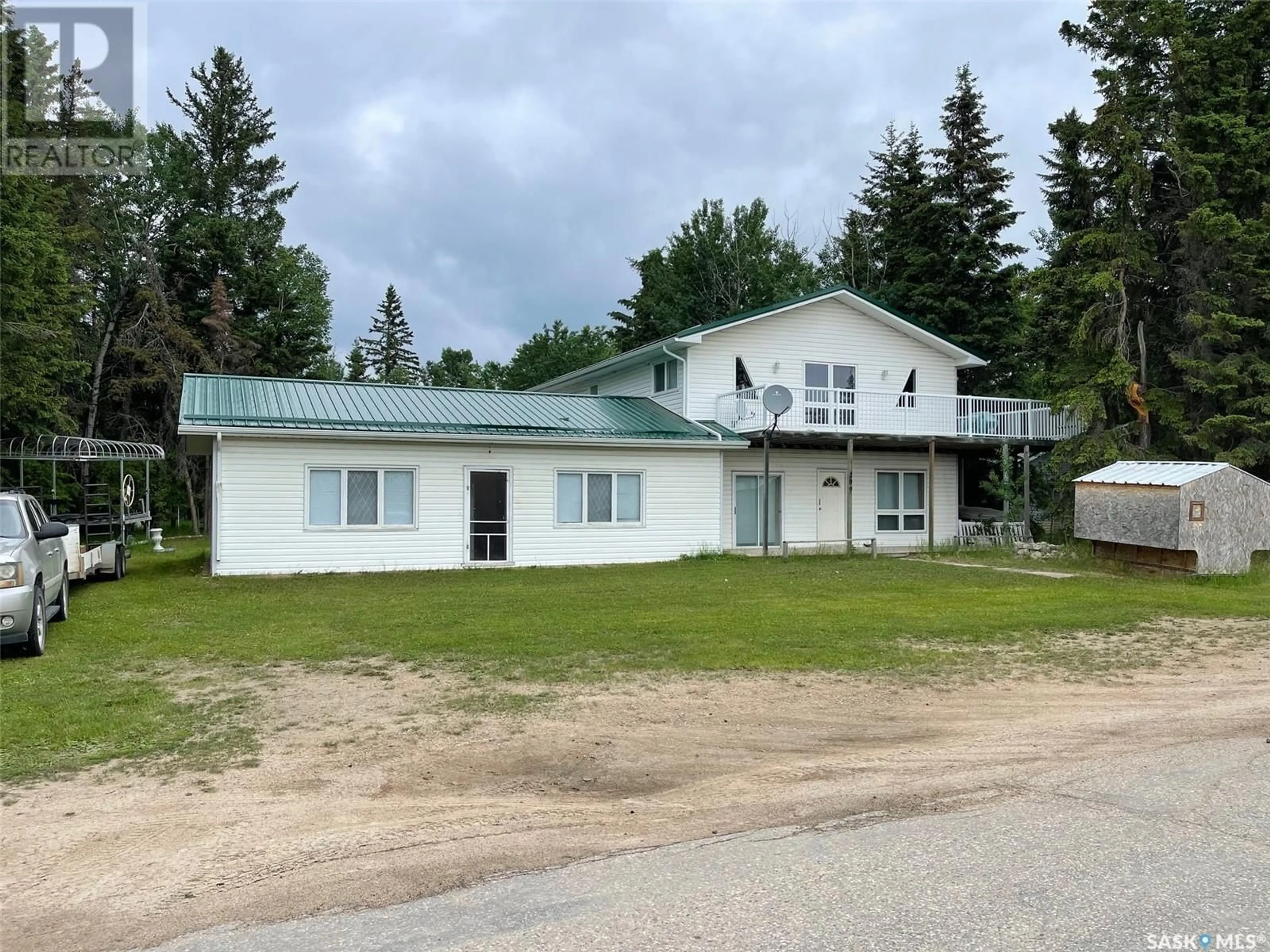 A pic from outside/outdoor area/front of a property/back of a property/a pic from drone, building for 209 PINE STREET, Chitek Lake Saskatchewan S0J0L0