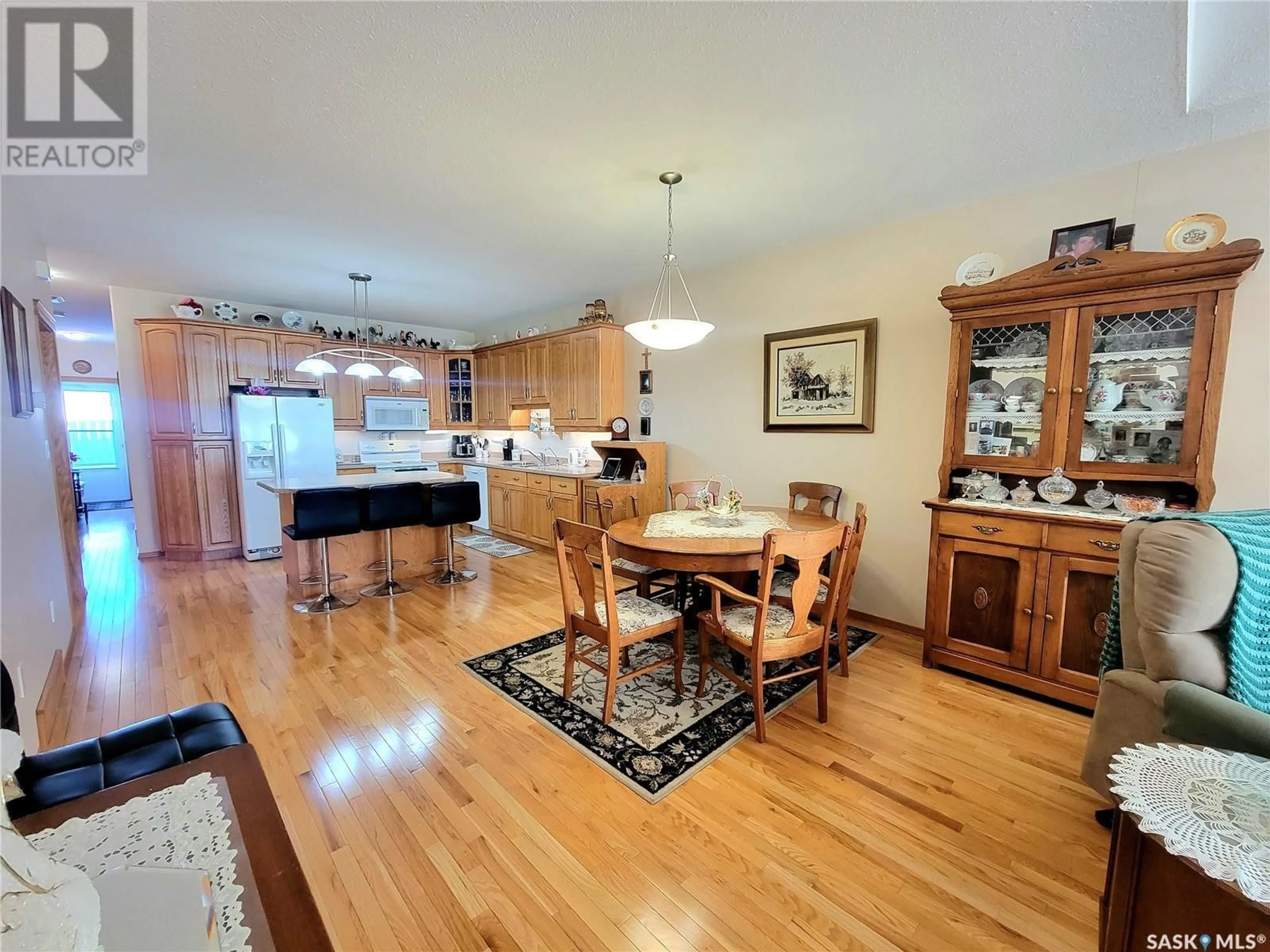 Open concept kitchen, wood/laminate floor for 2 5364 PROGRESS STREET, Macklin Saskatchewan S0L2C0