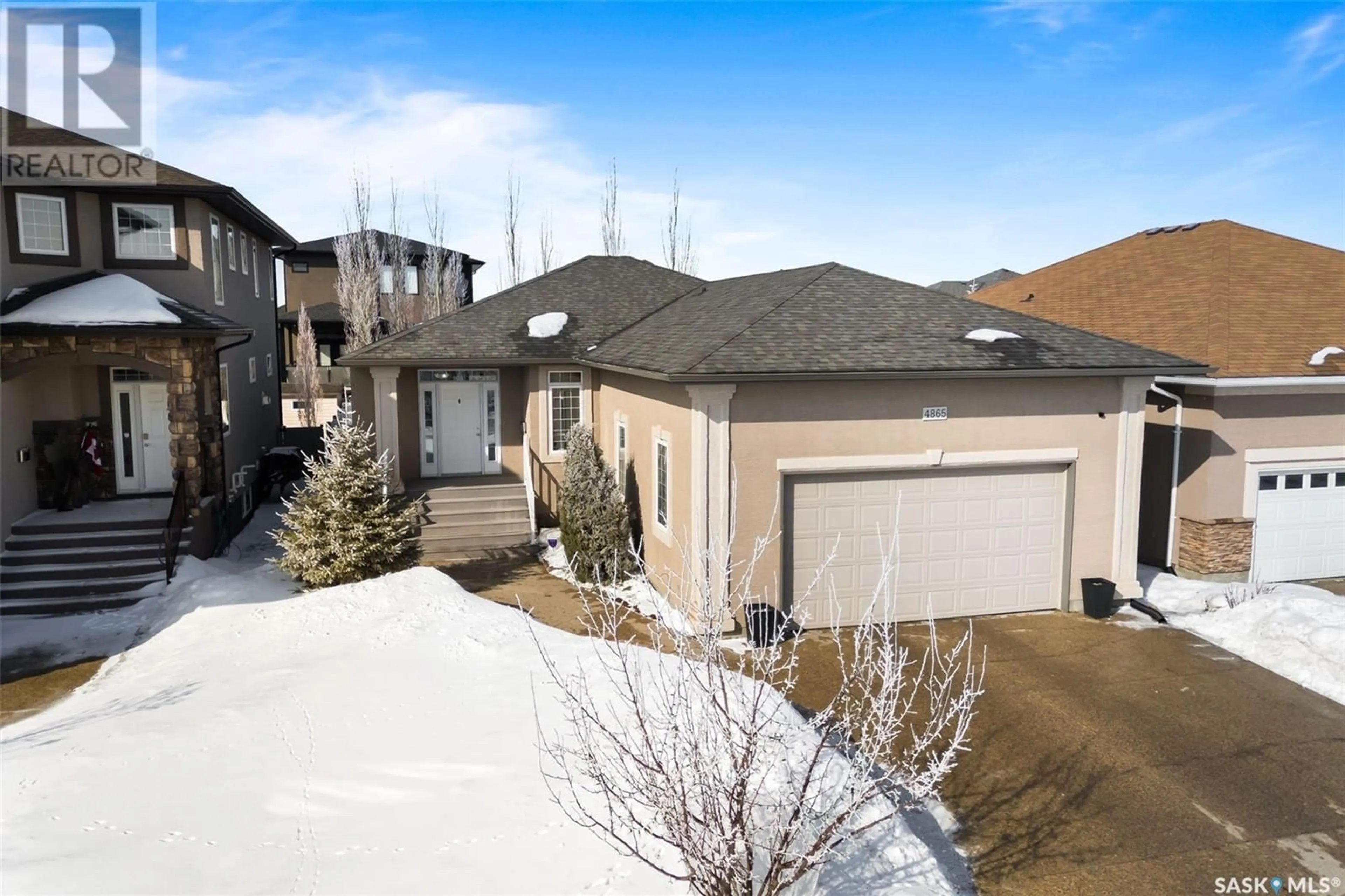 A pic from outside/outdoor area/front of a property/back of a property/a pic from drone, street for 4865 McCombie CRESCENT, Regina Saskatchewan S4W0A9