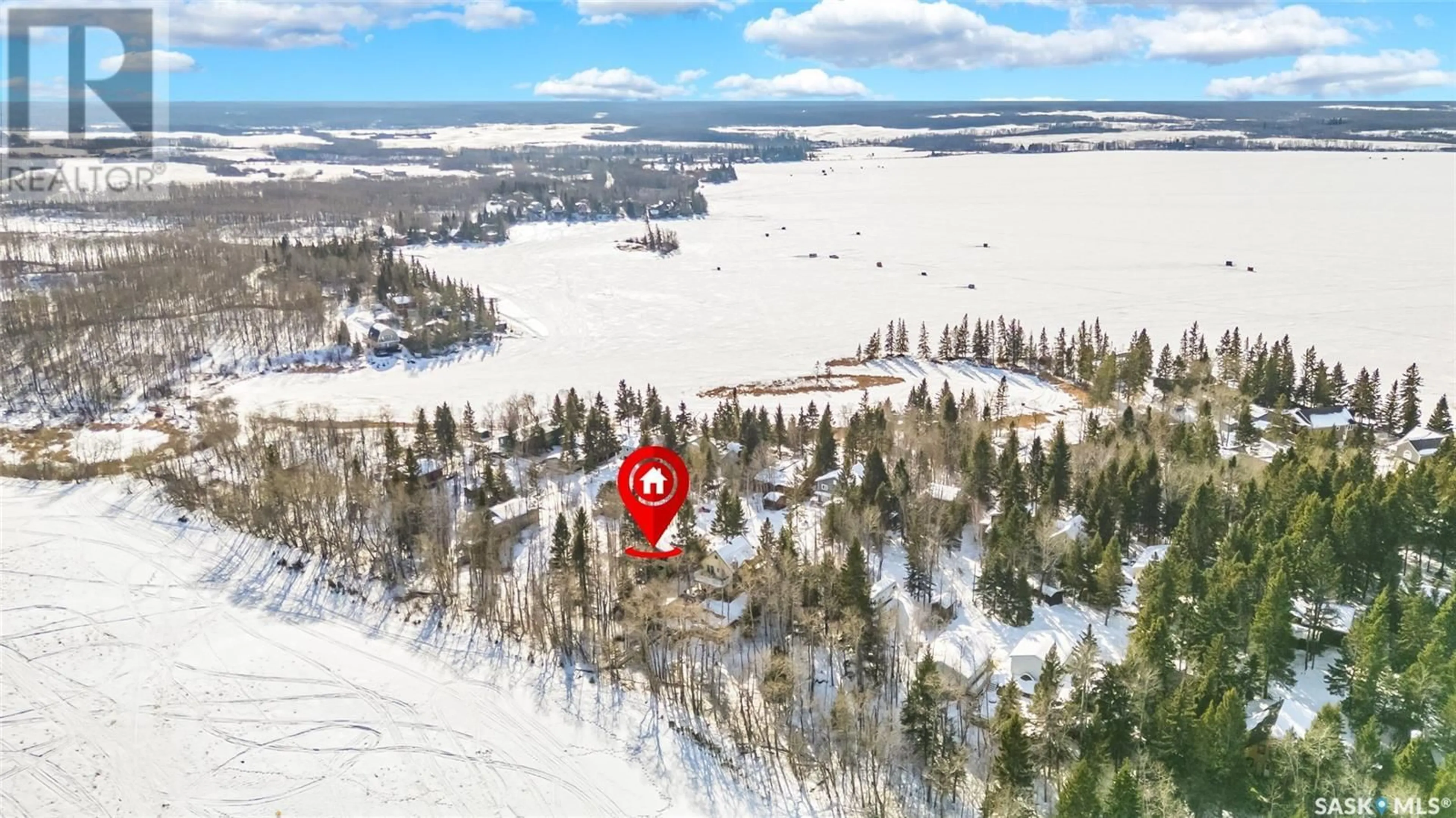 A pic from outside/outdoor area/front of a property/back of a property/a pic from drone, water/lake/river/ocean view for 317 SUNSET DRIVE, Echo Bay Saskatchewan S0J2G0