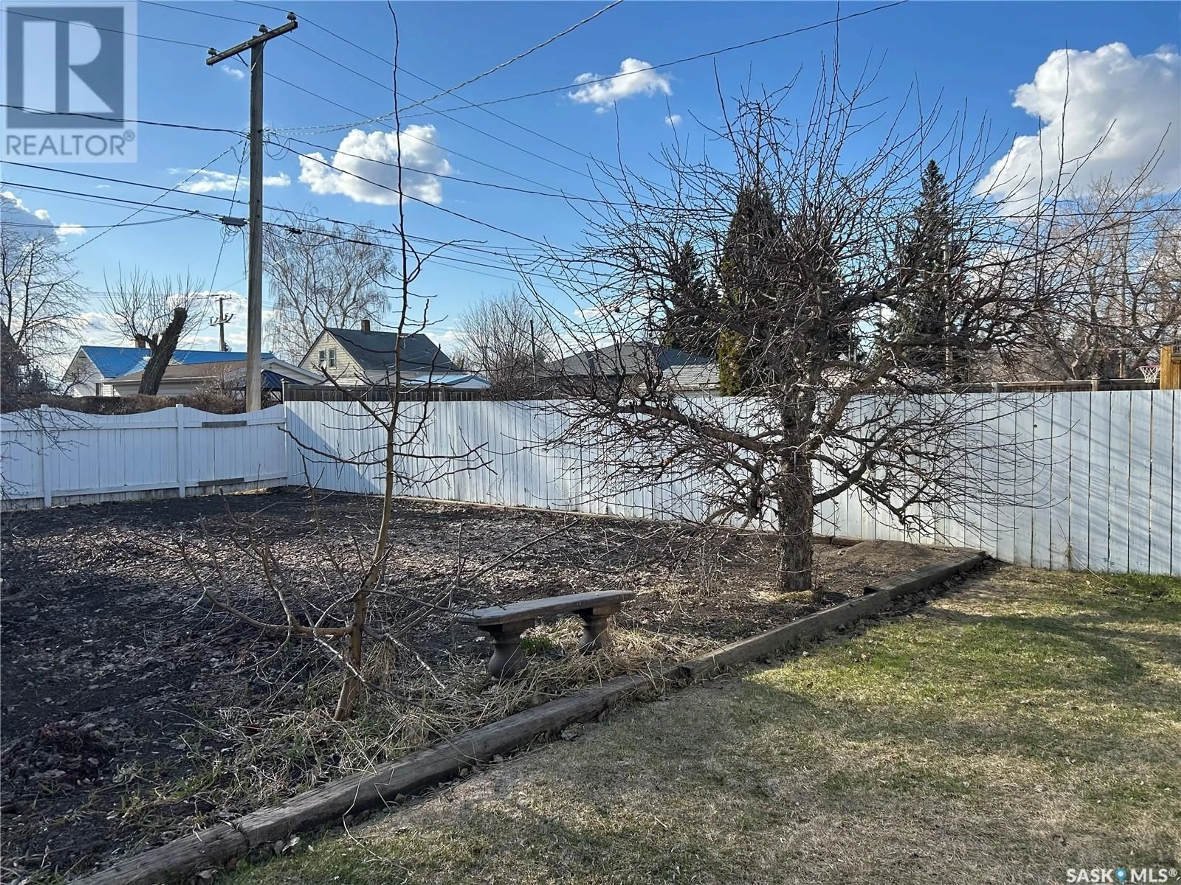 A pic from outside/outdoor area/front of a property/back of a property/a pic from drone, unknown for 819 9TH STREET, Humboldt Saskatchewan S0K2A0