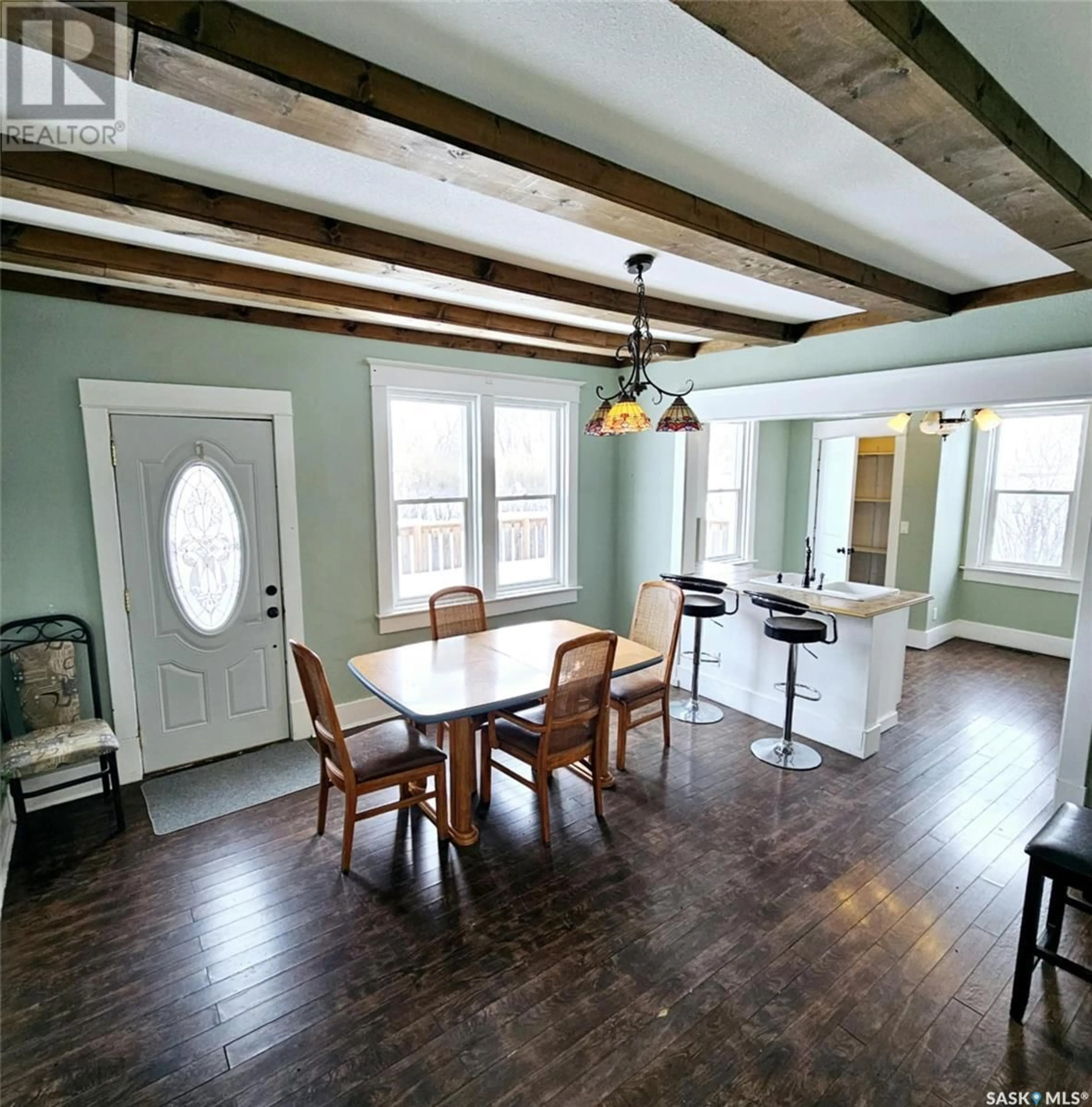 Dining room, wood/laminate floor for 24 WALKER AVENUE, Yarbo Saskatchewan S0A4V0