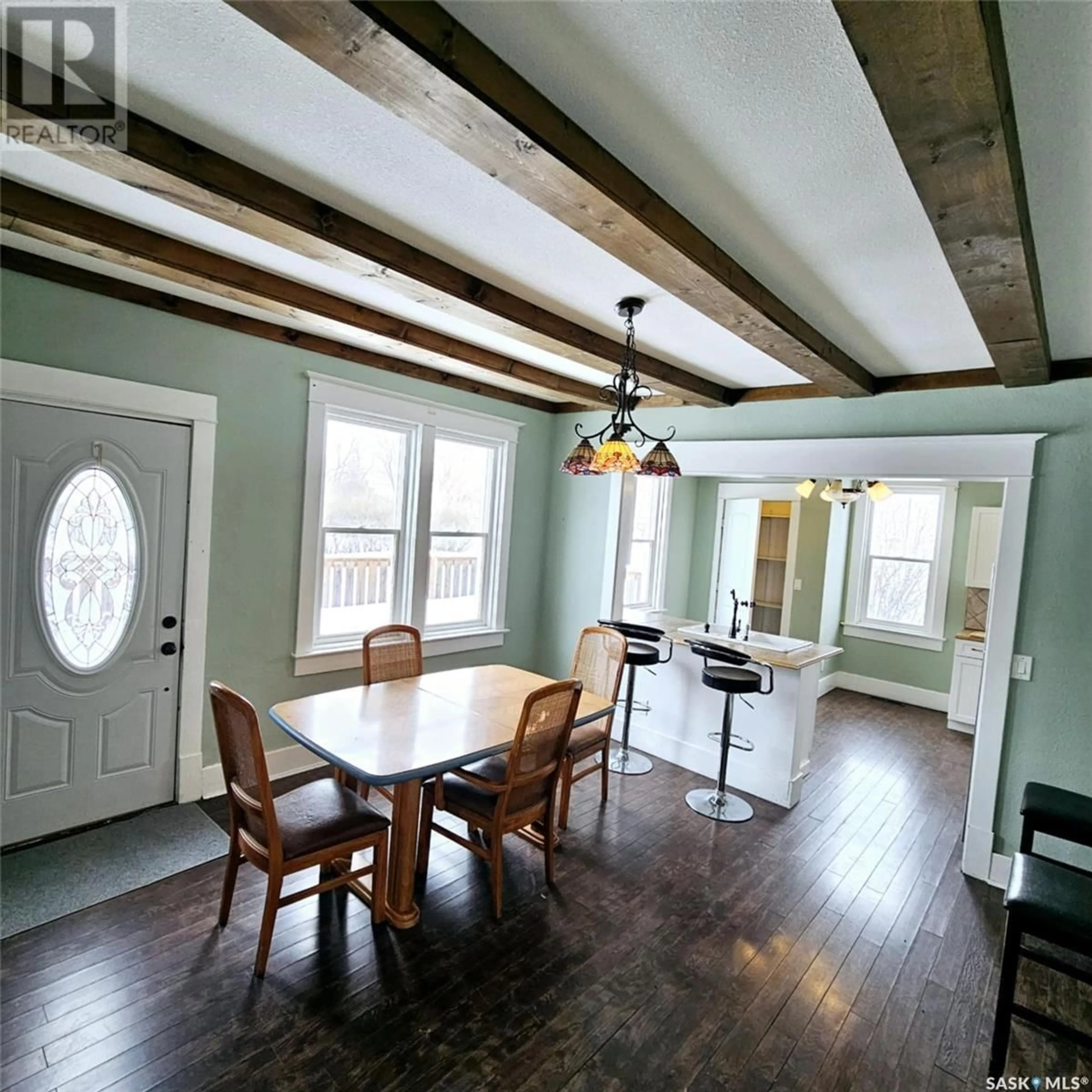 Dining room, wood/laminate floor for 24 WALKER AVENUE, Yarbo Saskatchewan S0A4V0