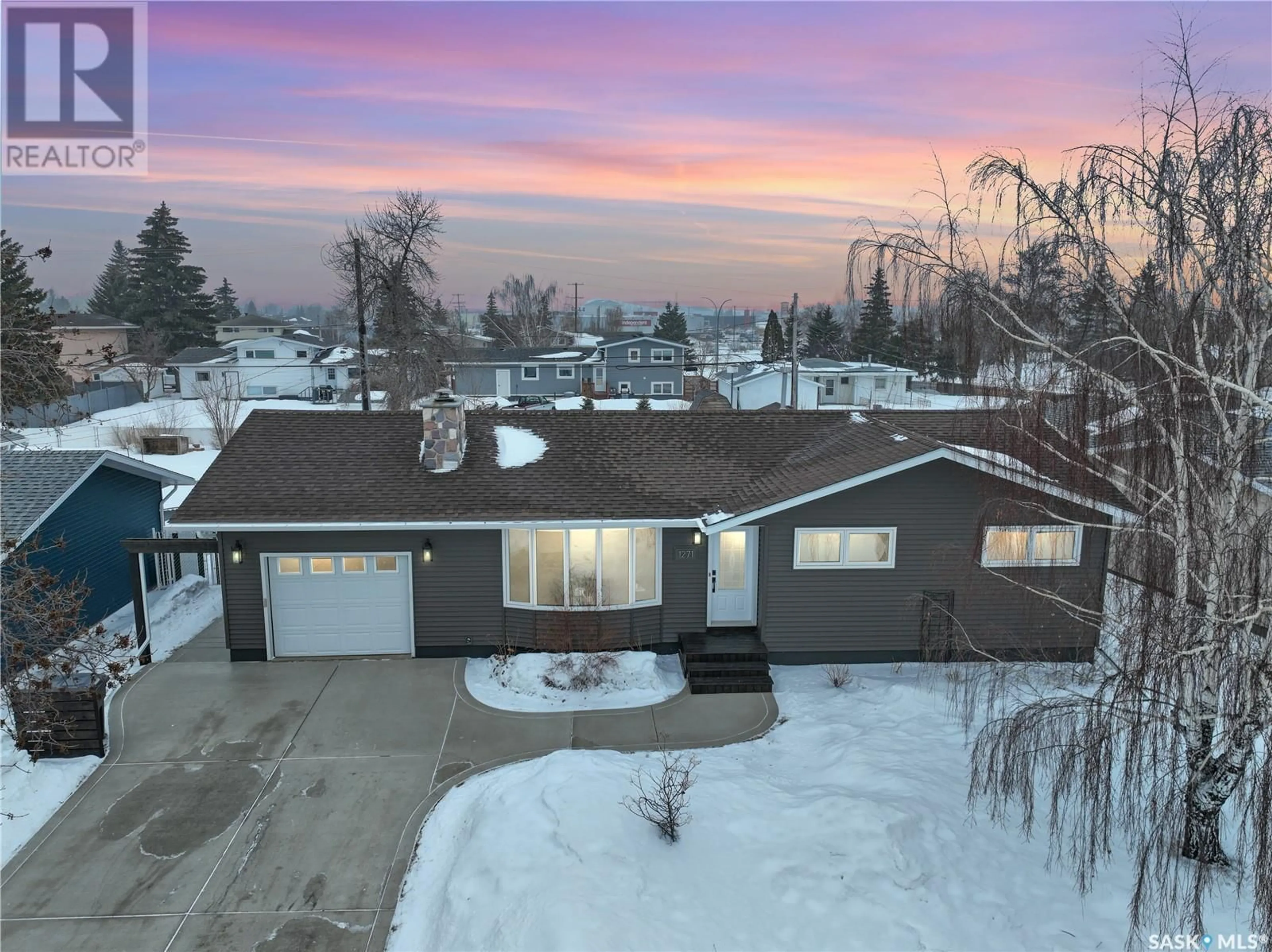 A pic from outside/outdoor area/front of a property/back of a property/a pic from drone, street for 1271 Main STREET, Melville Saskatchewan S0A2P0