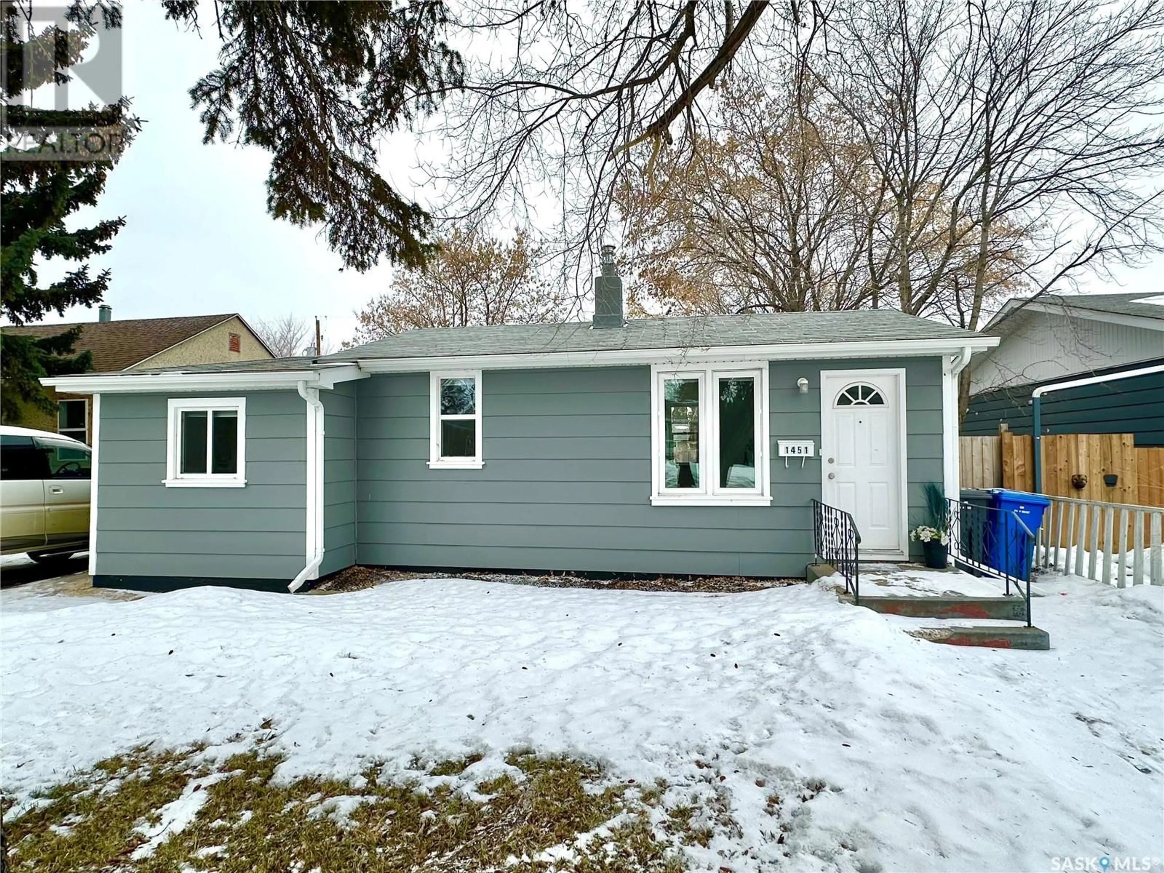 Home with vinyl exterior material, street for 1451 109th STREET, North Battleford Saskatchewan S9A2G2