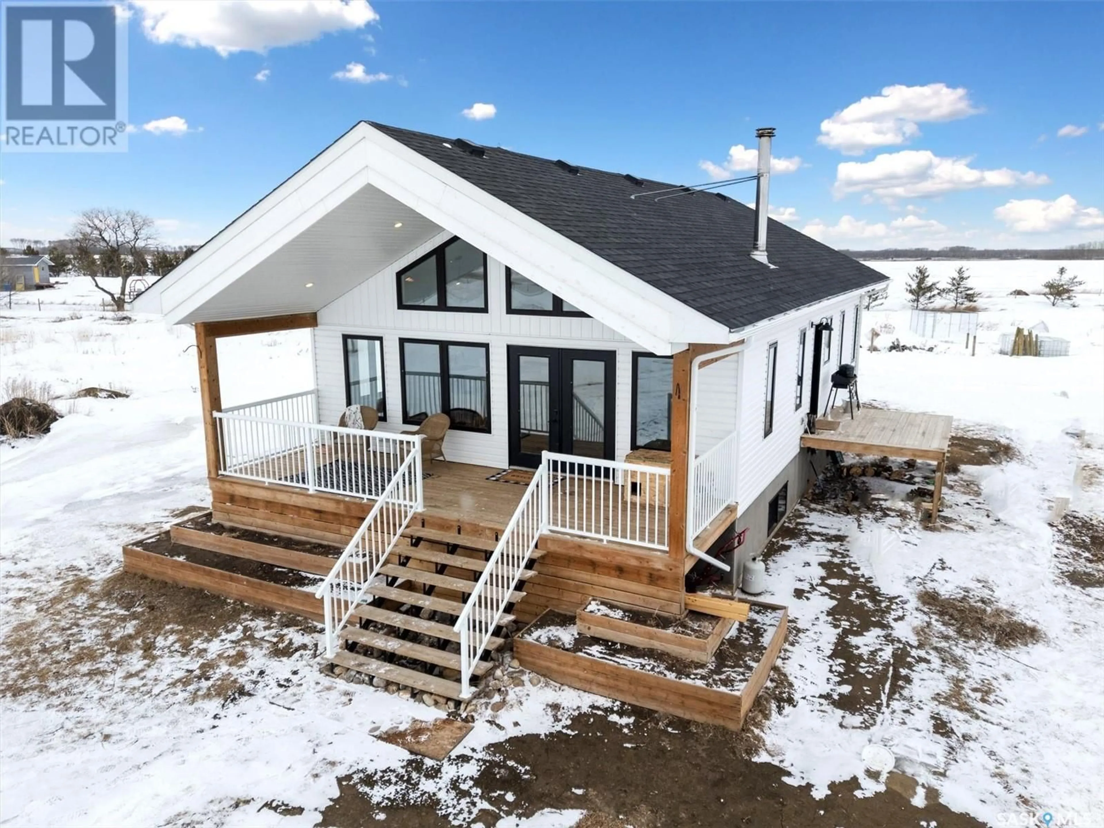 Home with vinyl exterior material, building for Dyck Acreage, Vanscoy Rm No. 345 Saskatchewan S0K0J0