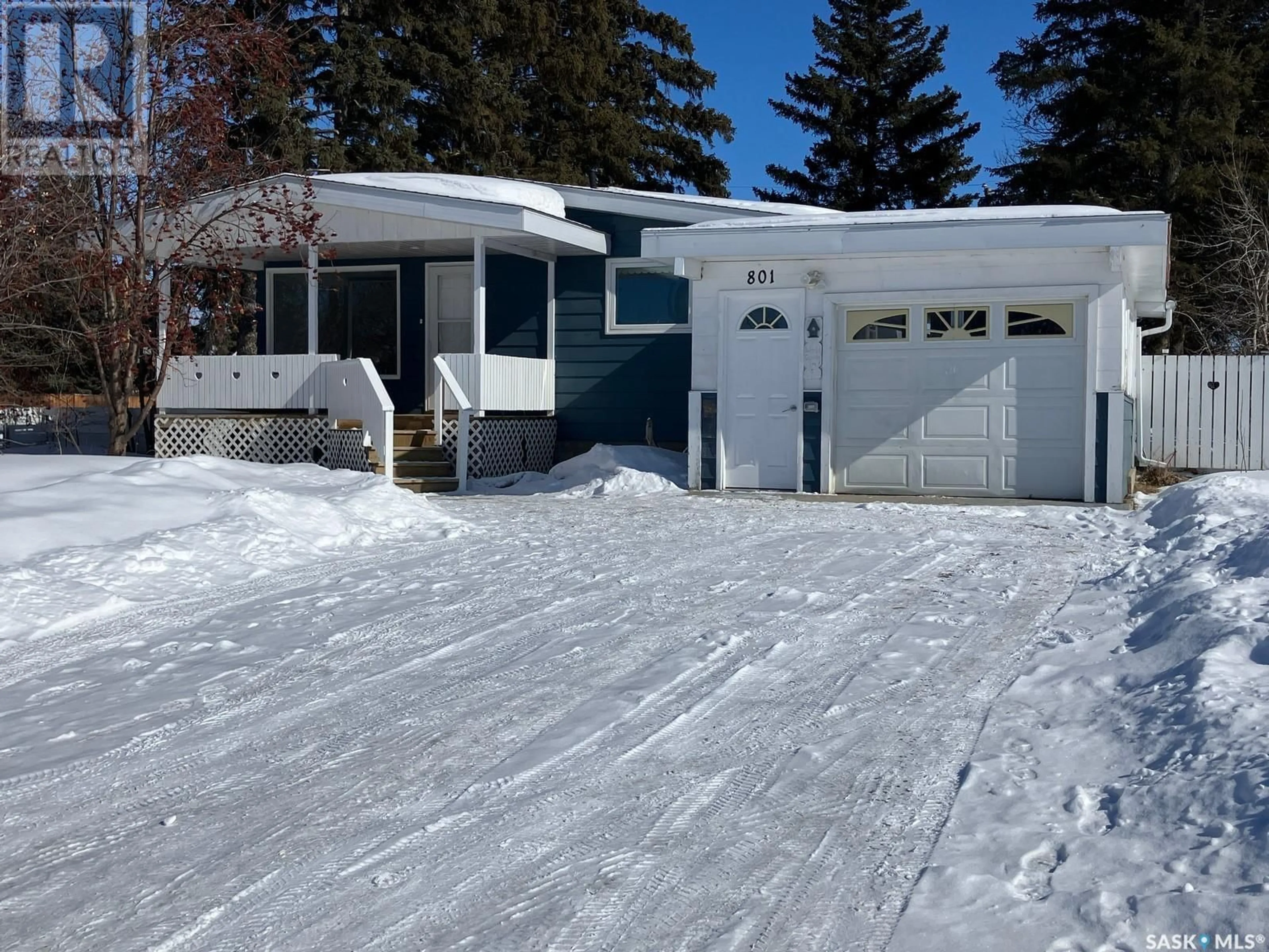 Home with vinyl exterior material, street for 801 1st STREET W, Nipawin Saskatchewan S0E1E0