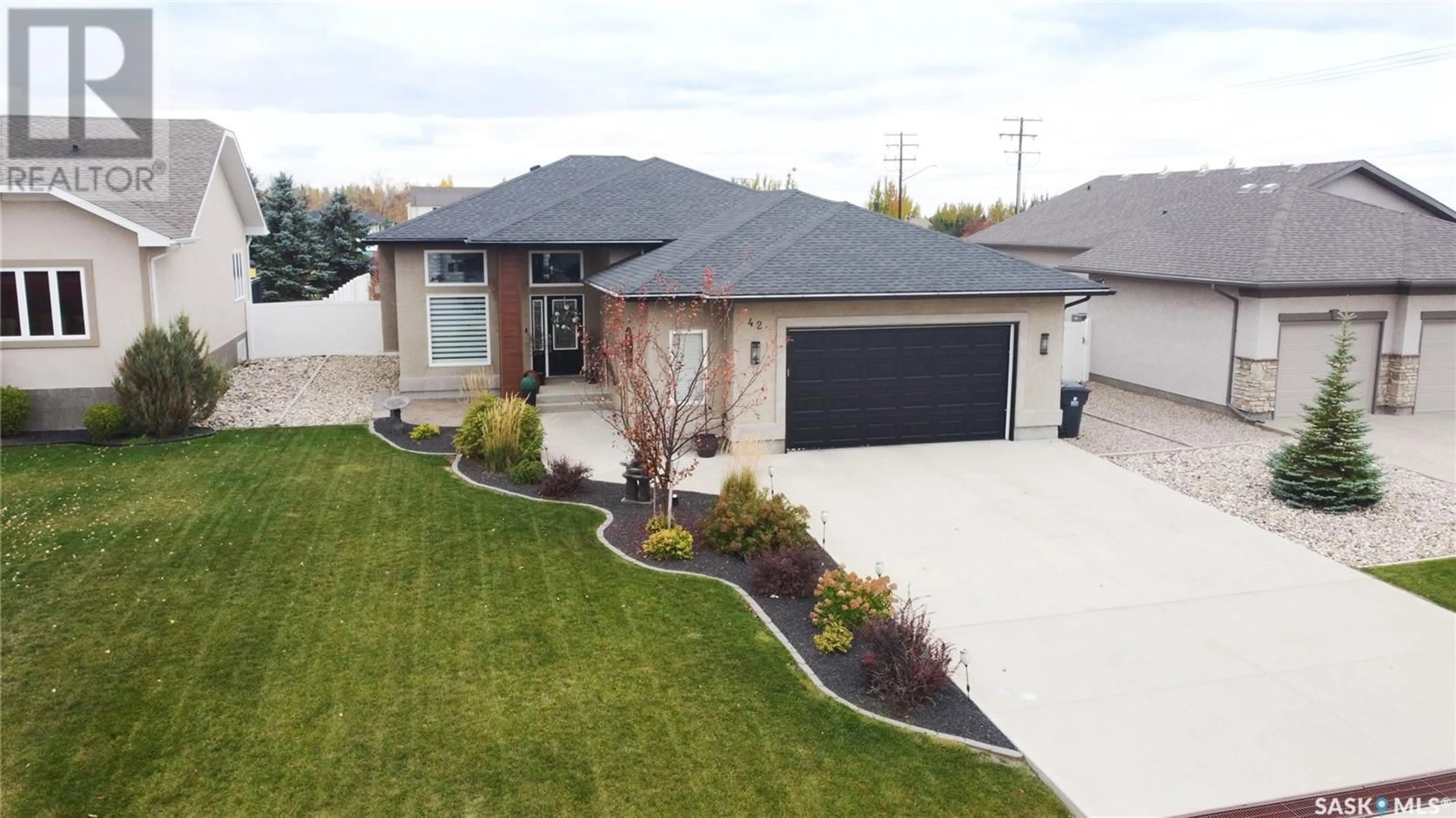 Home with brick exterior material, street for 42 EMERALD RIDGE E, White City Saskatchewan S4L0C5