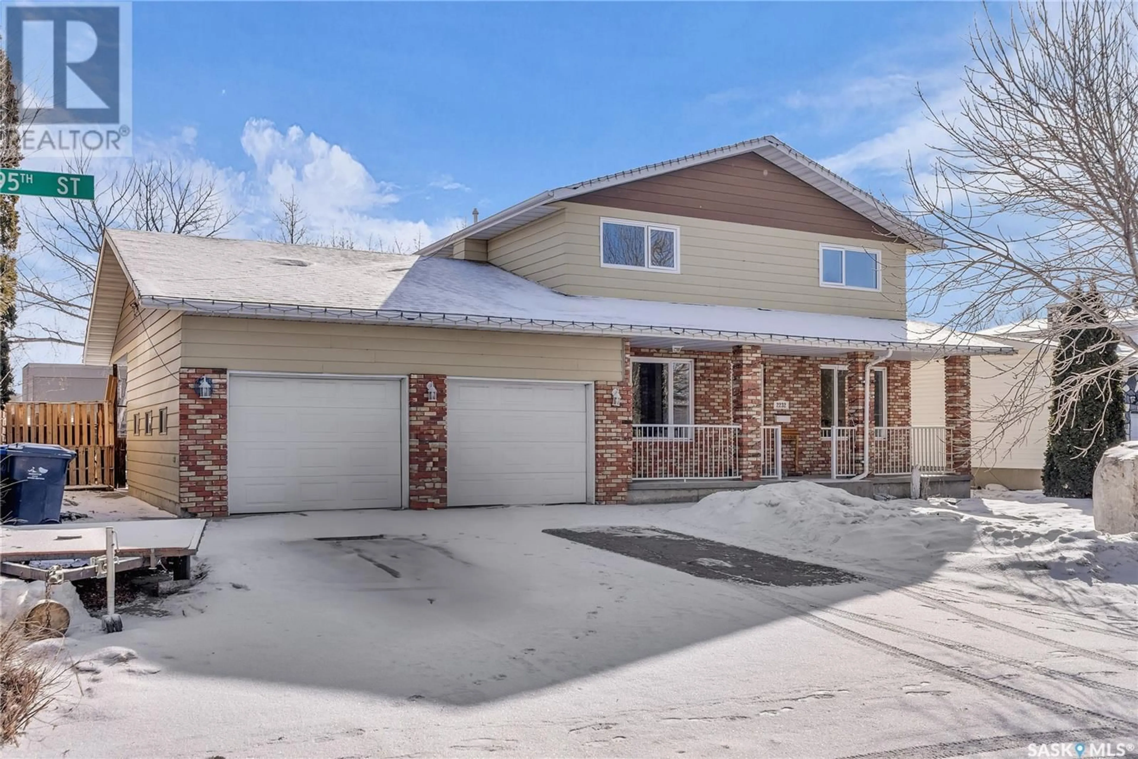Home with brick exterior material, street for 2232 95TH STREET, North Battleford Saskatchewan S9A3G2