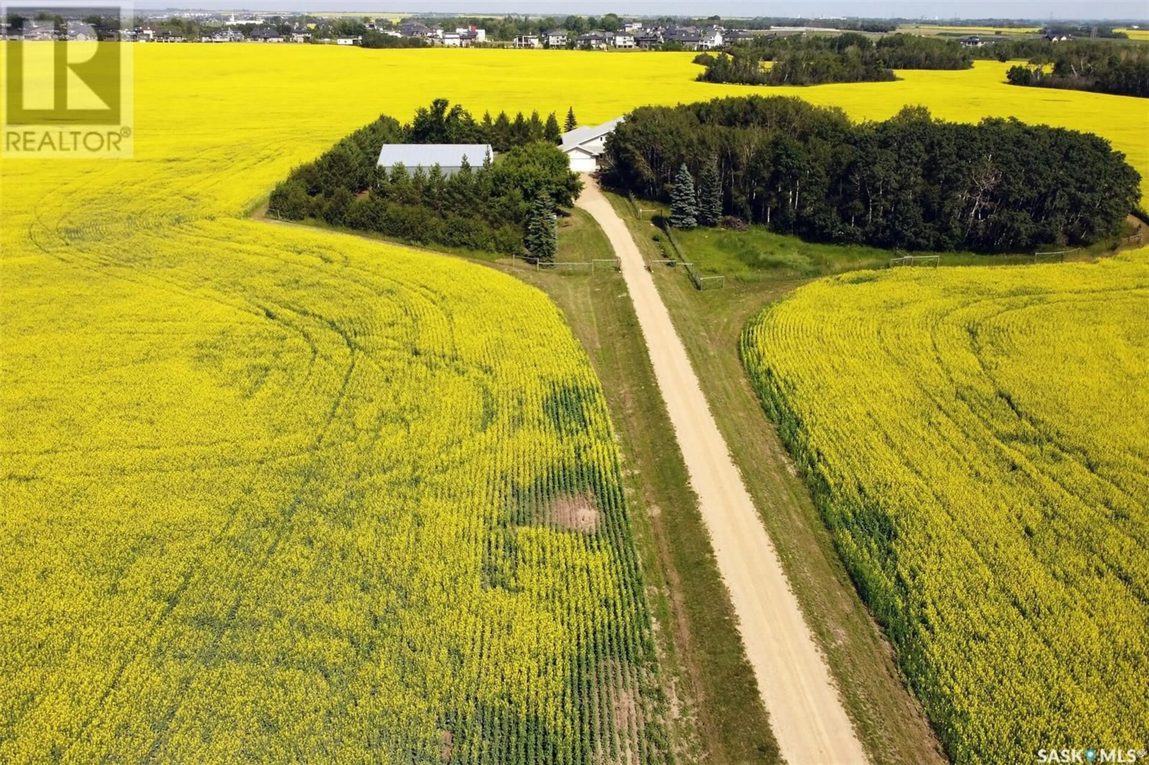 A pic from outside/outdoor area/front of a property/back of a property/a pic from drone, unknown for PRIVATE COUNTRY LIVING AT THE CITY'S EDGE, Corman Park Rm No. 344 Saskatchewan S7K3J8