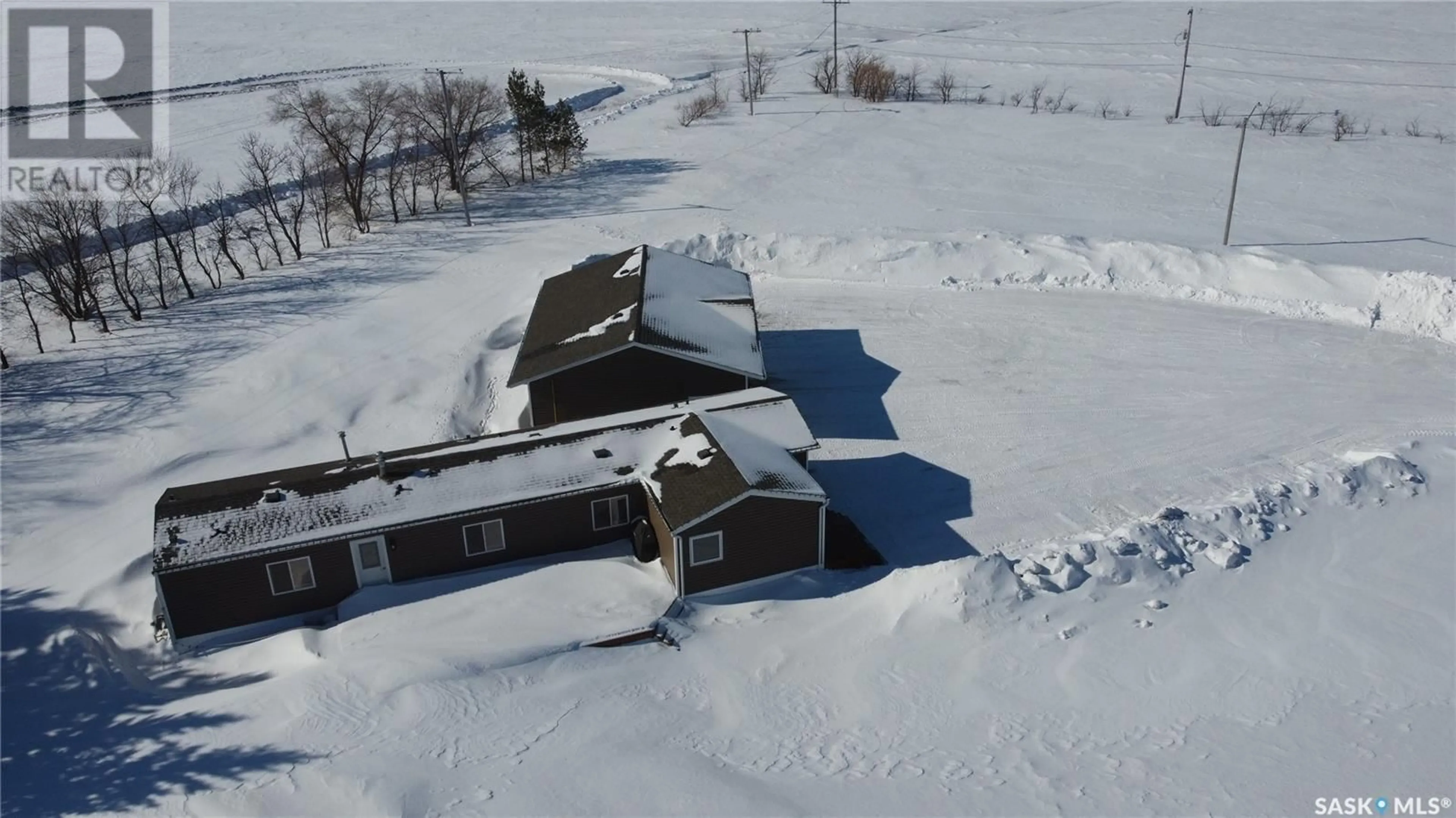 A pic from outside/outdoor area/front of a property/back of a property/a pic from drone, building for 105 WILLOW BAY, Annaheim Saskatchewan S0K0G0