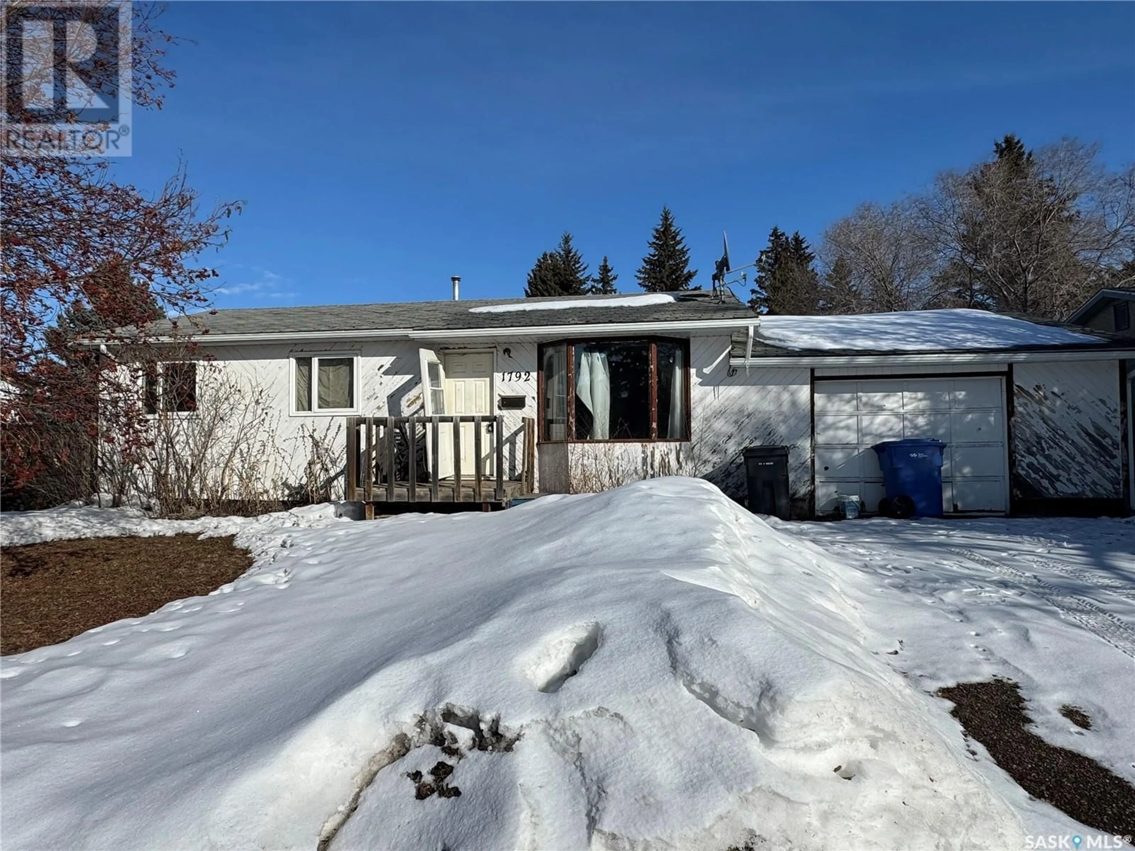 A pic from outside/outdoor area/front of a property/back of a property/a pic from drone, street for 1792 Trudeau STREET, North Battleford Saskatchewan S9A3G1