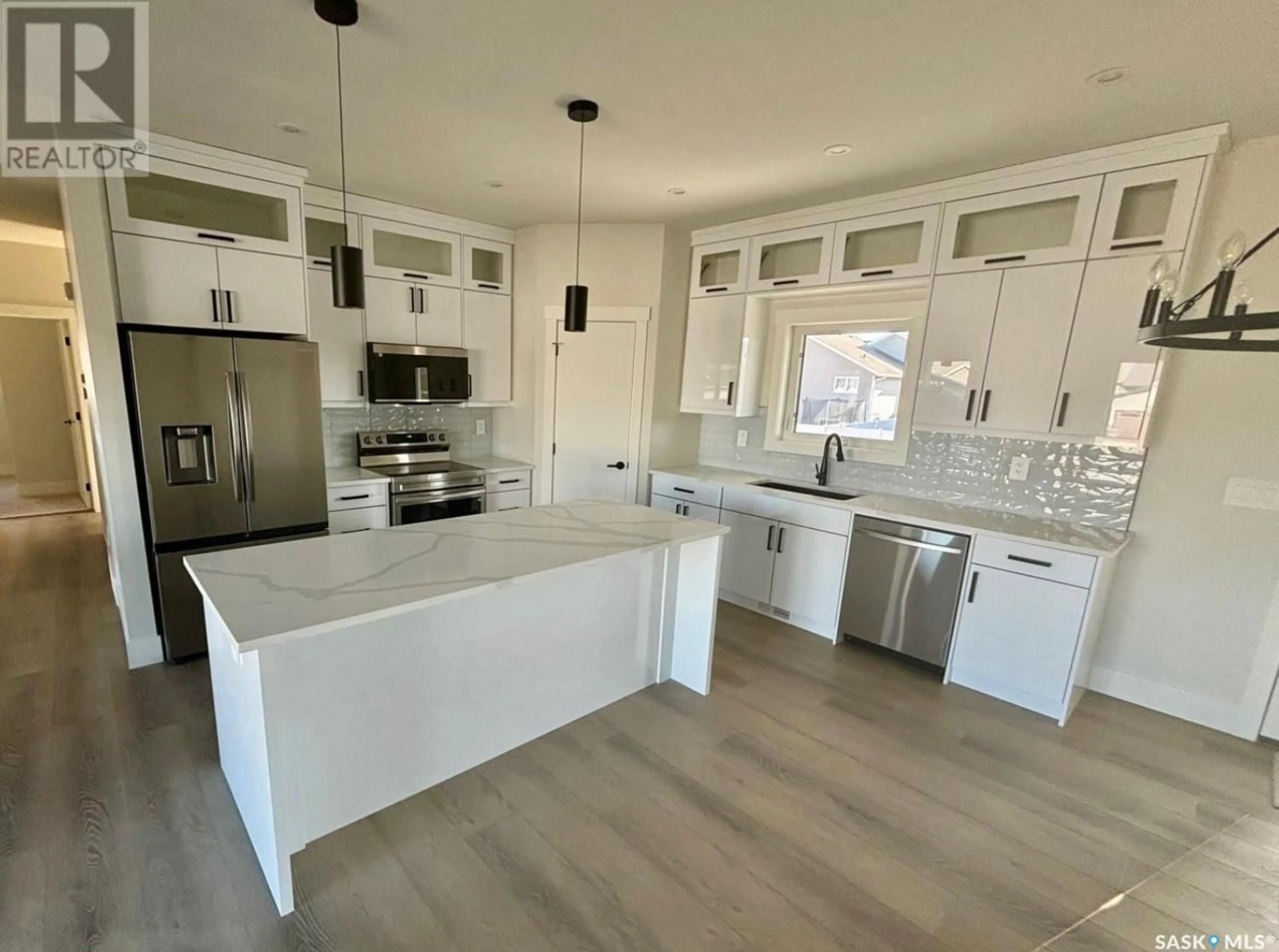 Open concept kitchen, unknown for 730 WEIR CRESCENT, Warman Saskatchewan S0K4S4