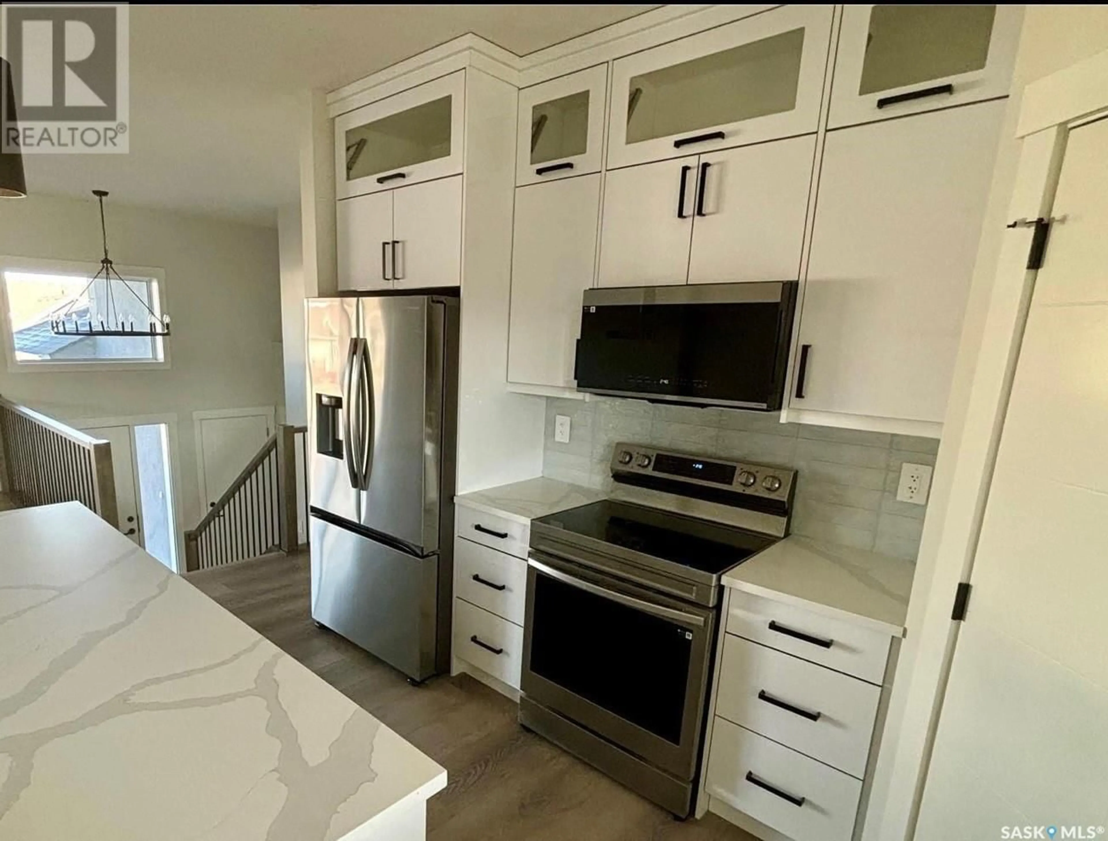 Open concept kitchen, ceramic/tile floor for 730 WEIR CRESCENT, Warman Saskatchewan S0K4S4