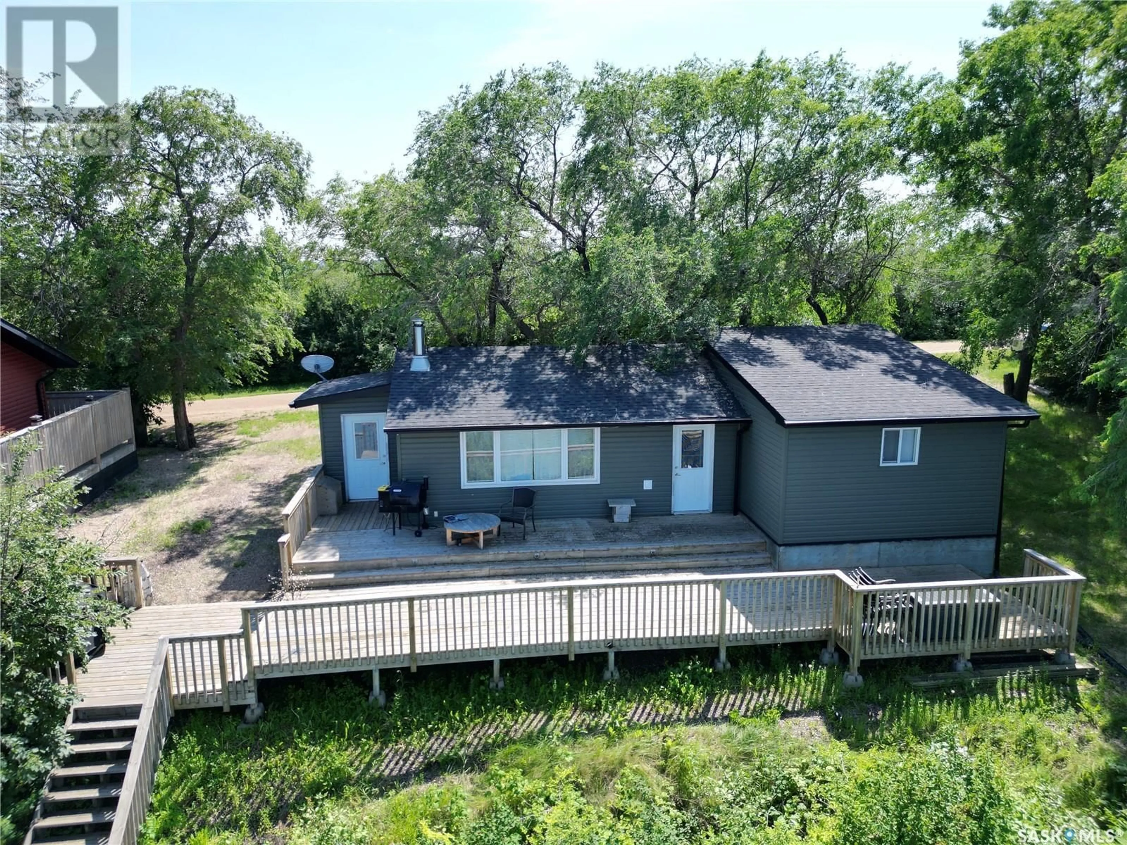 A pic from outside/outdoor area/front of a property/back of a property/a pic from drone, water/lake/river/ocean view for 9 Kilcare DRIVE, Meota Rm No.468 Saskatchewan S0M1X0