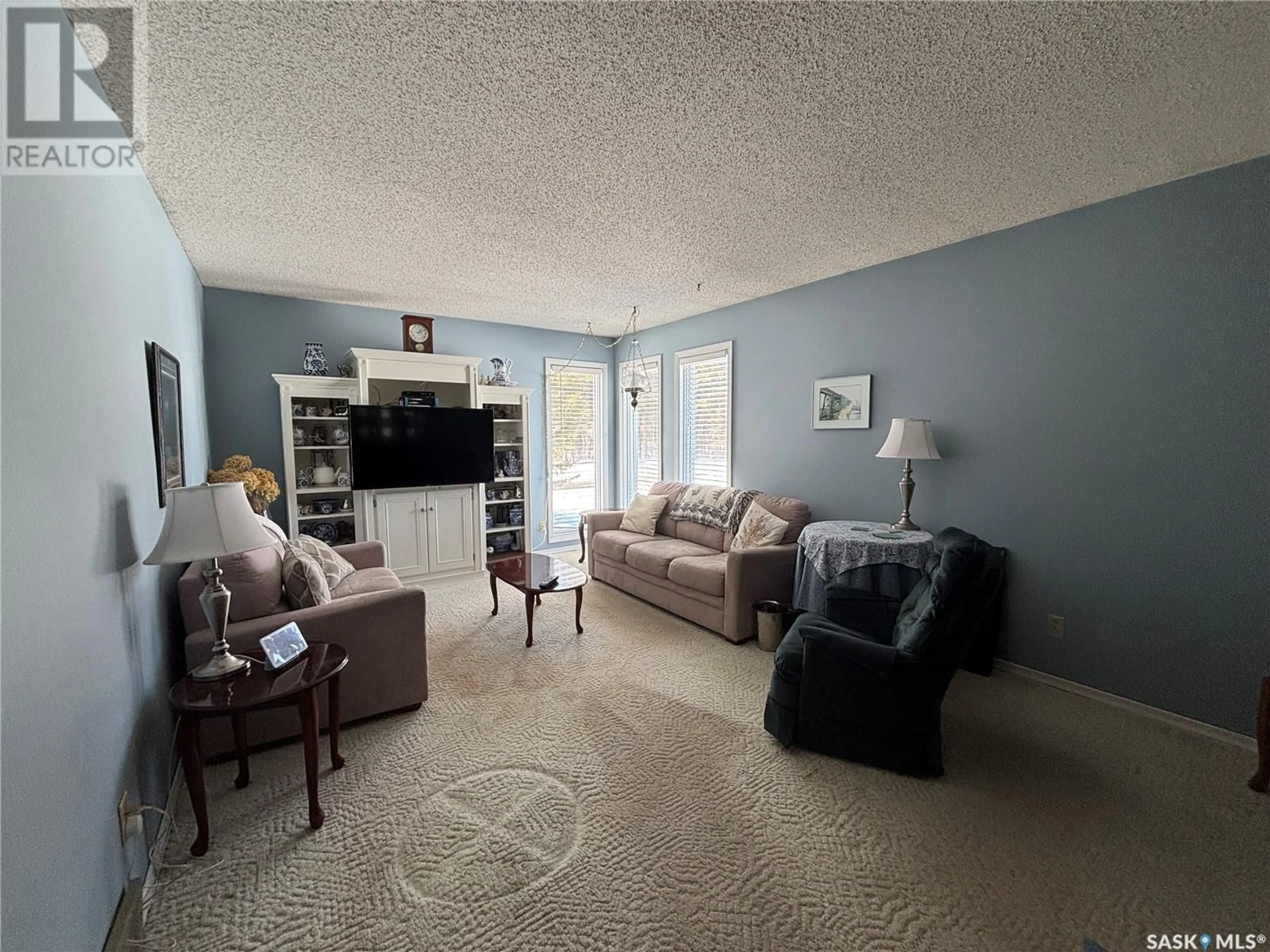 Living room with furniture, unknown for 609 10TH STREET, Nipawin Saskatchewan S0E1E0