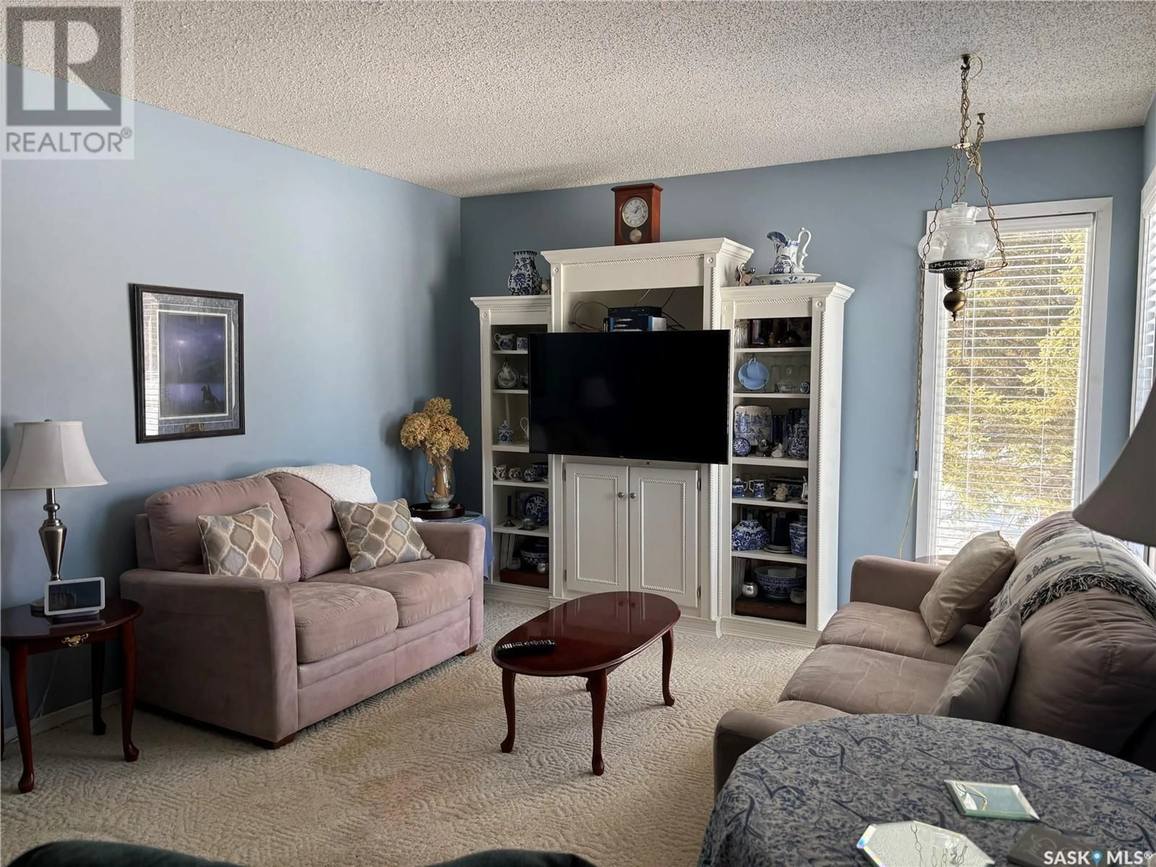 Living room with furniture, unknown for 609 10TH STREET, Nipawin Saskatchewan S0E1E0