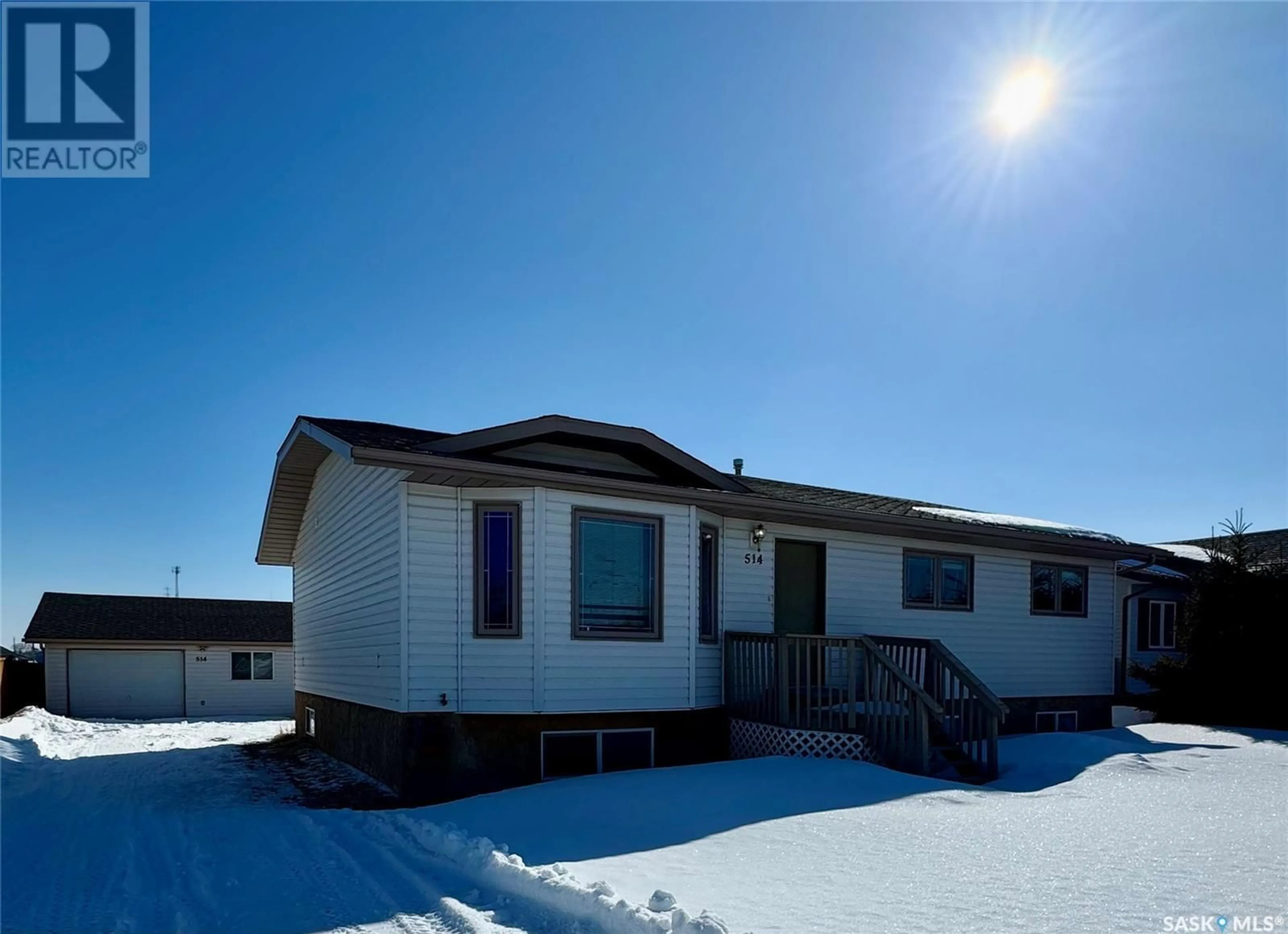 Home with vinyl exterior material, street for 514 MACMILLIAN STREET, Hudson Bay Saskatchewan S0E0Y0