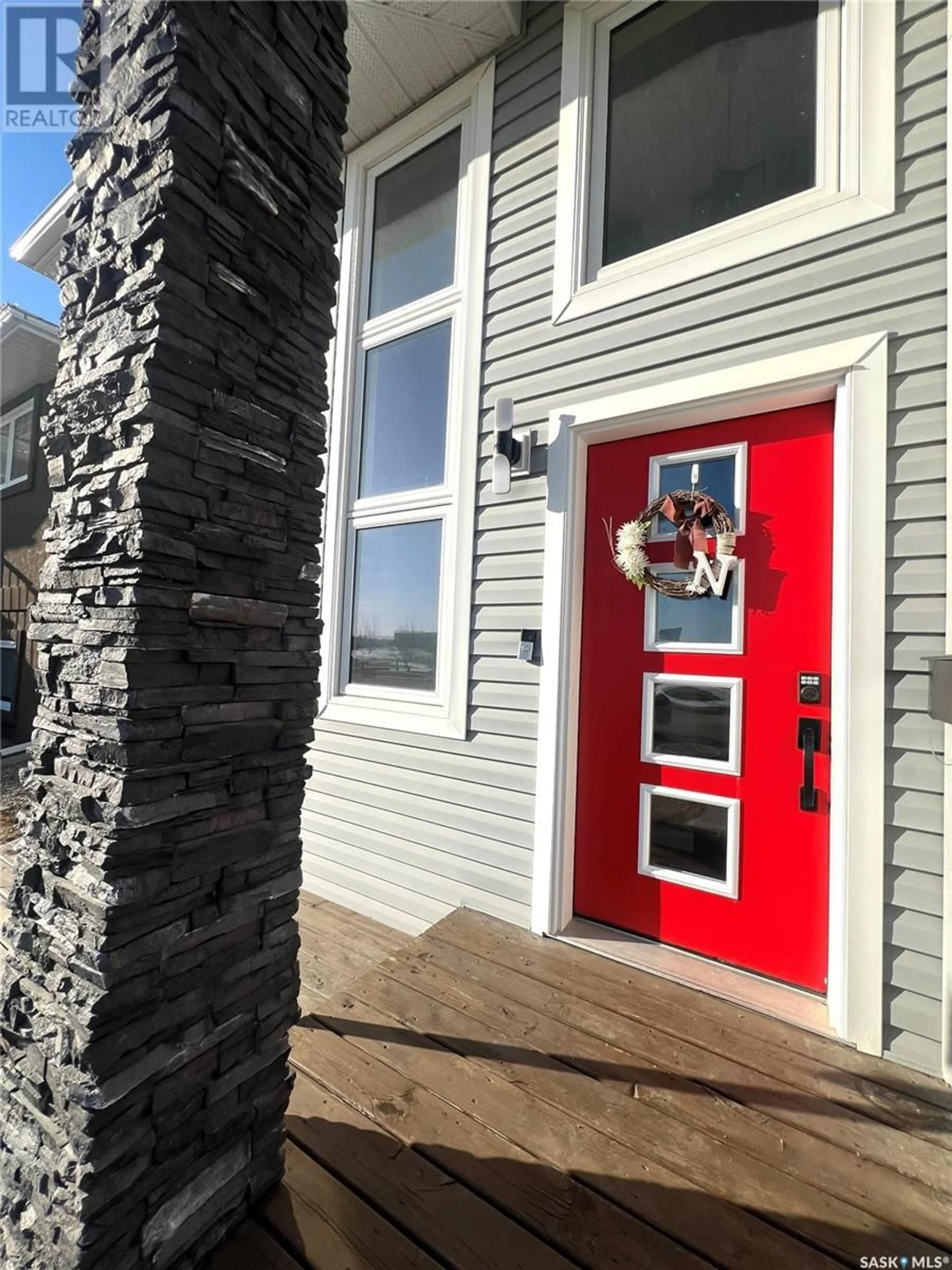 Home with vinyl exterior material, street for 617 DOUGLAS DRIVE, Swift Current Saskatchewan S9H5R6