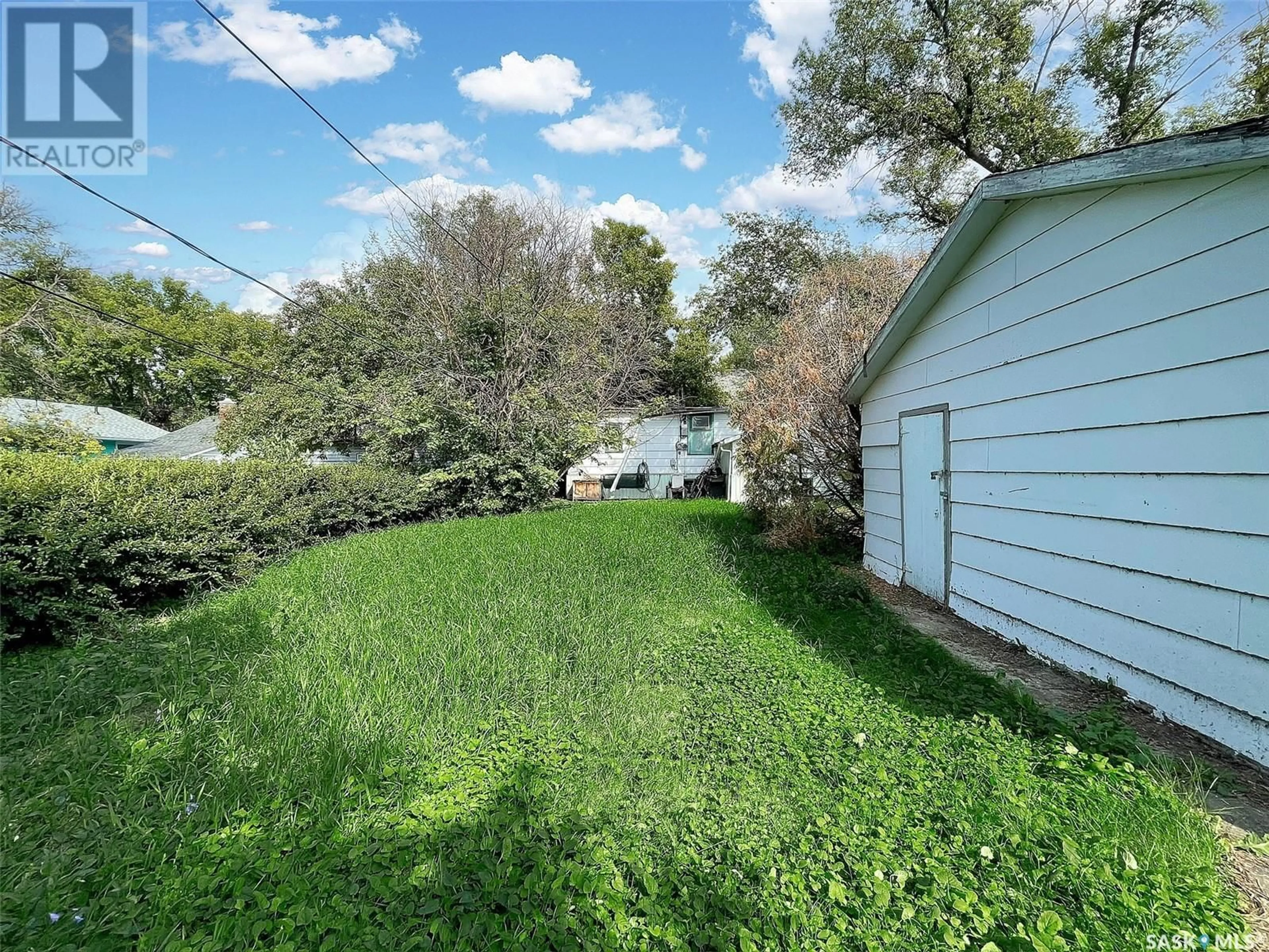 A pic from outside/outdoor area/front of a property/back of a property/a pic from drone, water/lake/river/ocean view for 310 6TH AVENUE, Swift Current Saskatchewan S9H3P1