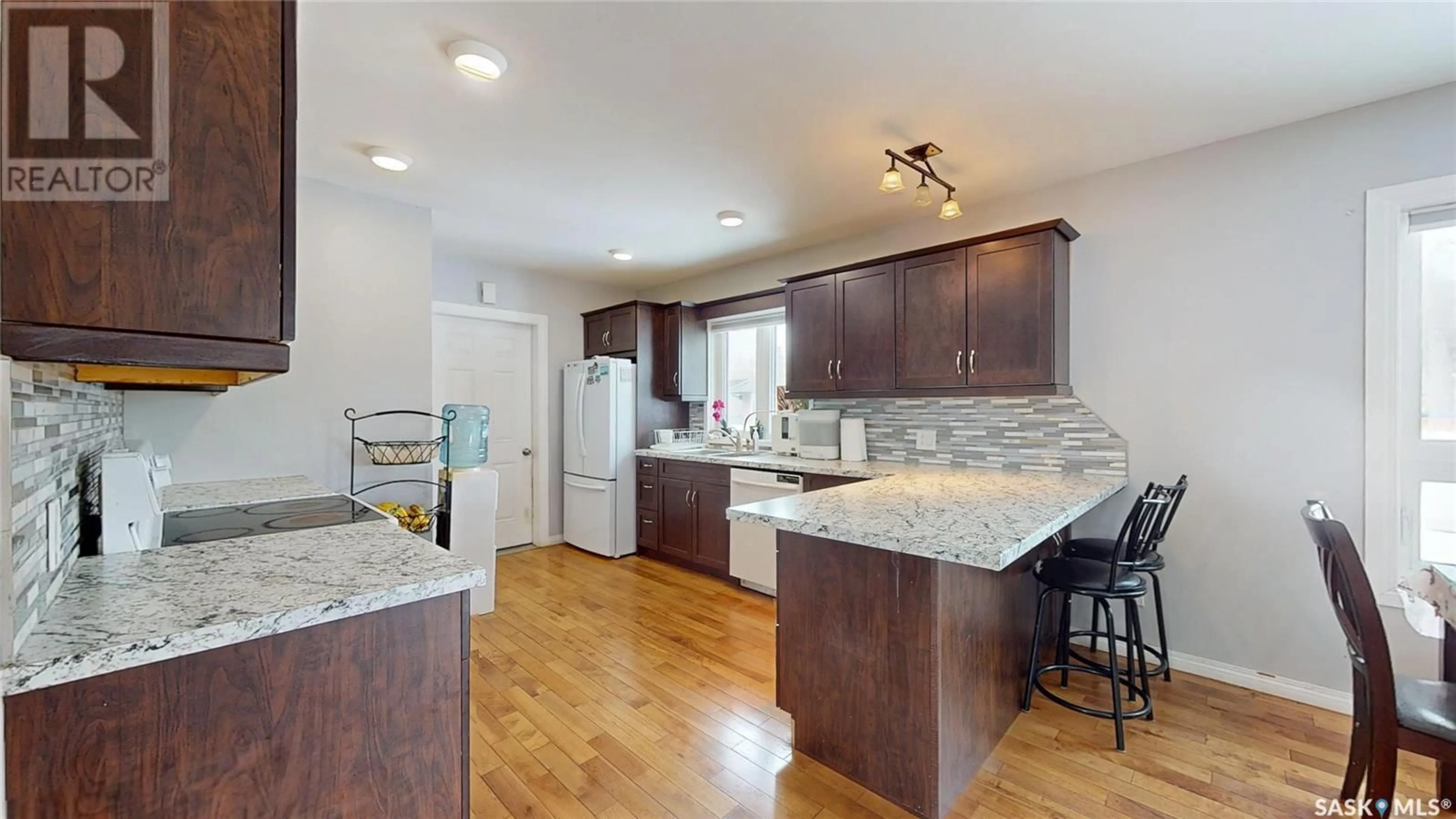 Open concept kitchen, unknown for 1401 MARK AVENUE, Moosomin Saskatchewan S0G3N0