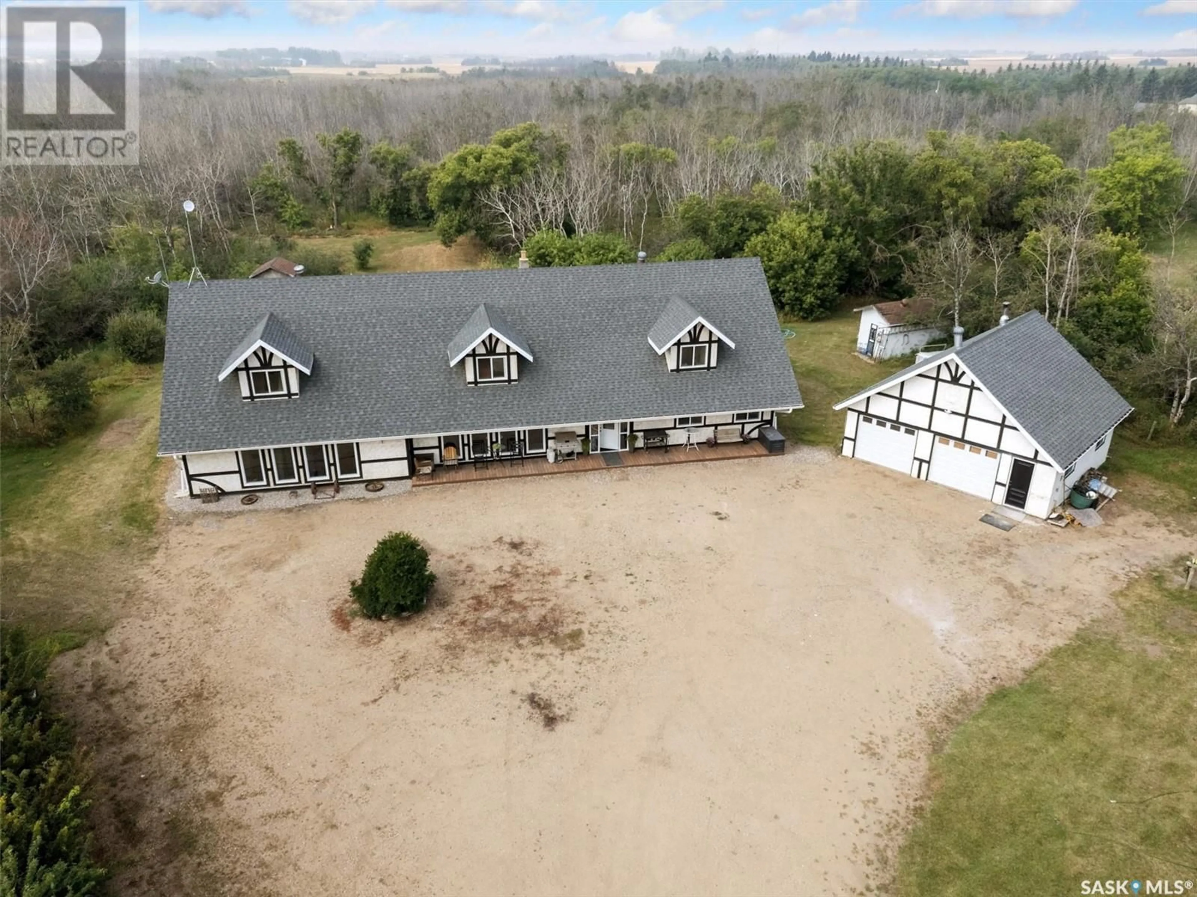 A pic from outside/outdoor area/front of a property/back of a property/a pic from drone, unknown for DIONNE LABORDE ACREAGE, Corman Park Rm No. 344 Saskatchewan S0K1E0