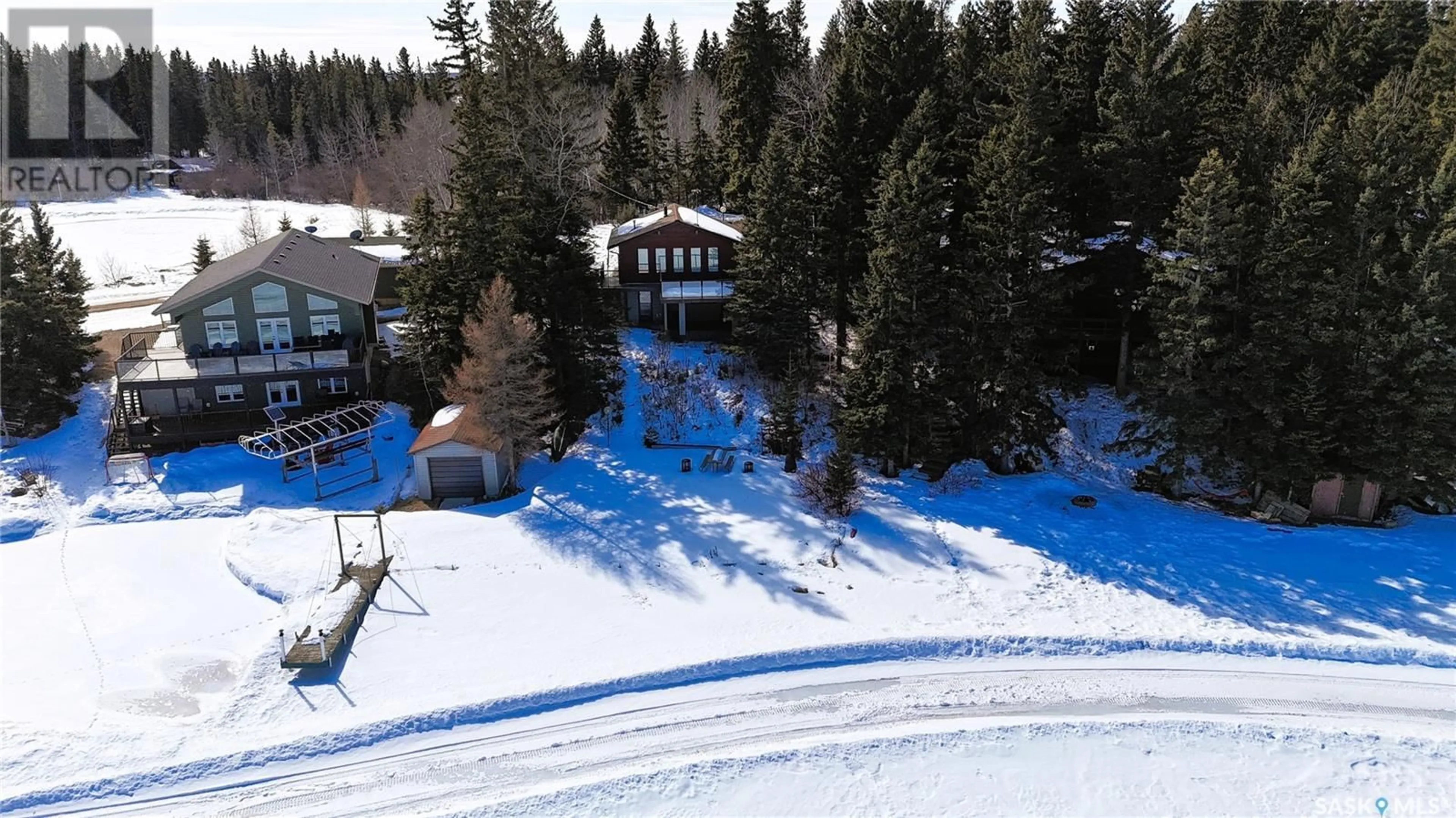 A pic from outside/outdoor area/front of a property/back of a property/a pic from drone, unknown for 102 LAKESHORE COURT, Echo Bay Saskatchewan S0J2G0