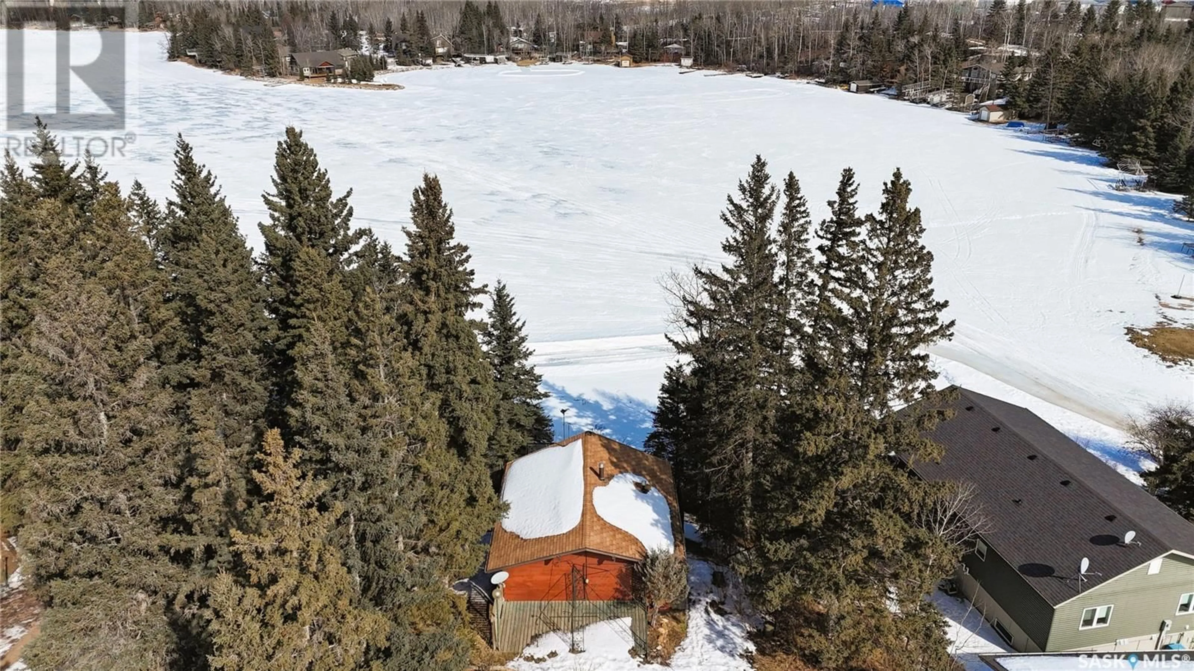 A pic from outside/outdoor area/front of a property/back of a property/a pic from drone, unknown for 102 LAKESHORE COURT, Echo Bay Saskatchewan S0J2G0